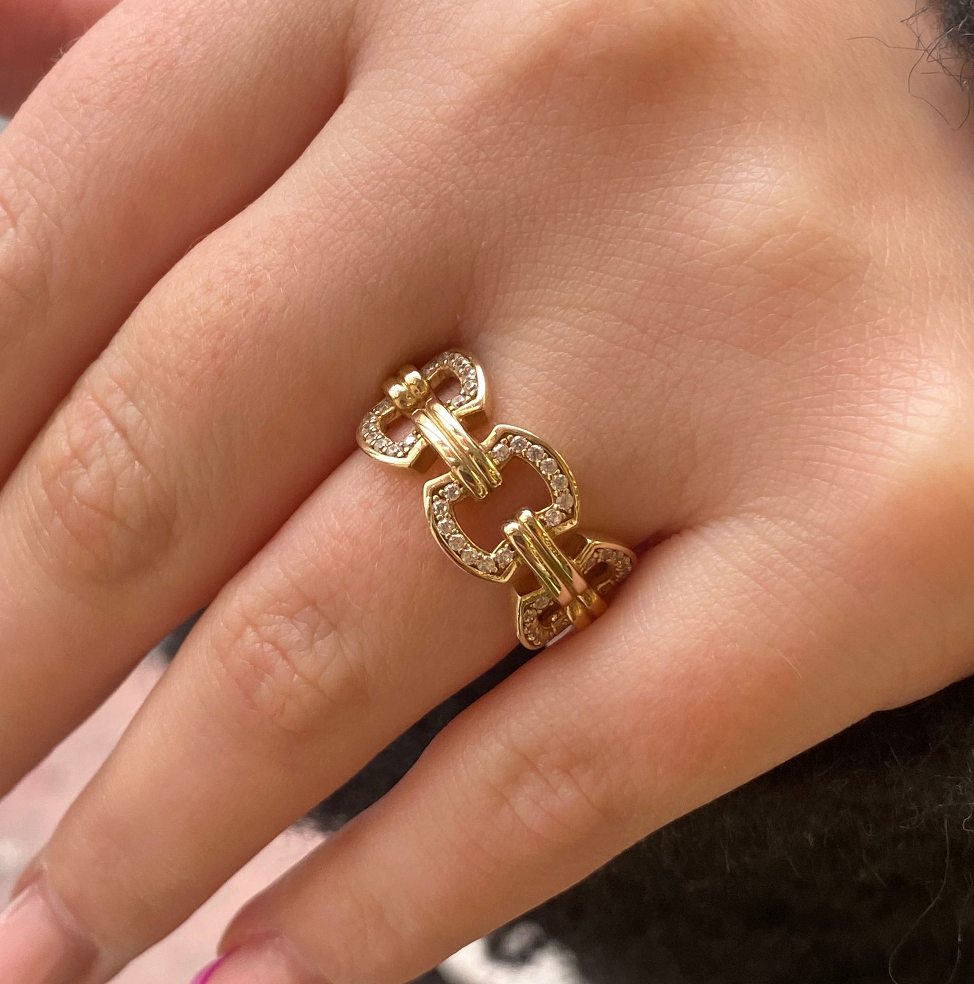 Sunshine CZ Pretty Link Ring by Comero featuring a delicate band with sparkling cubic zirconia accents.