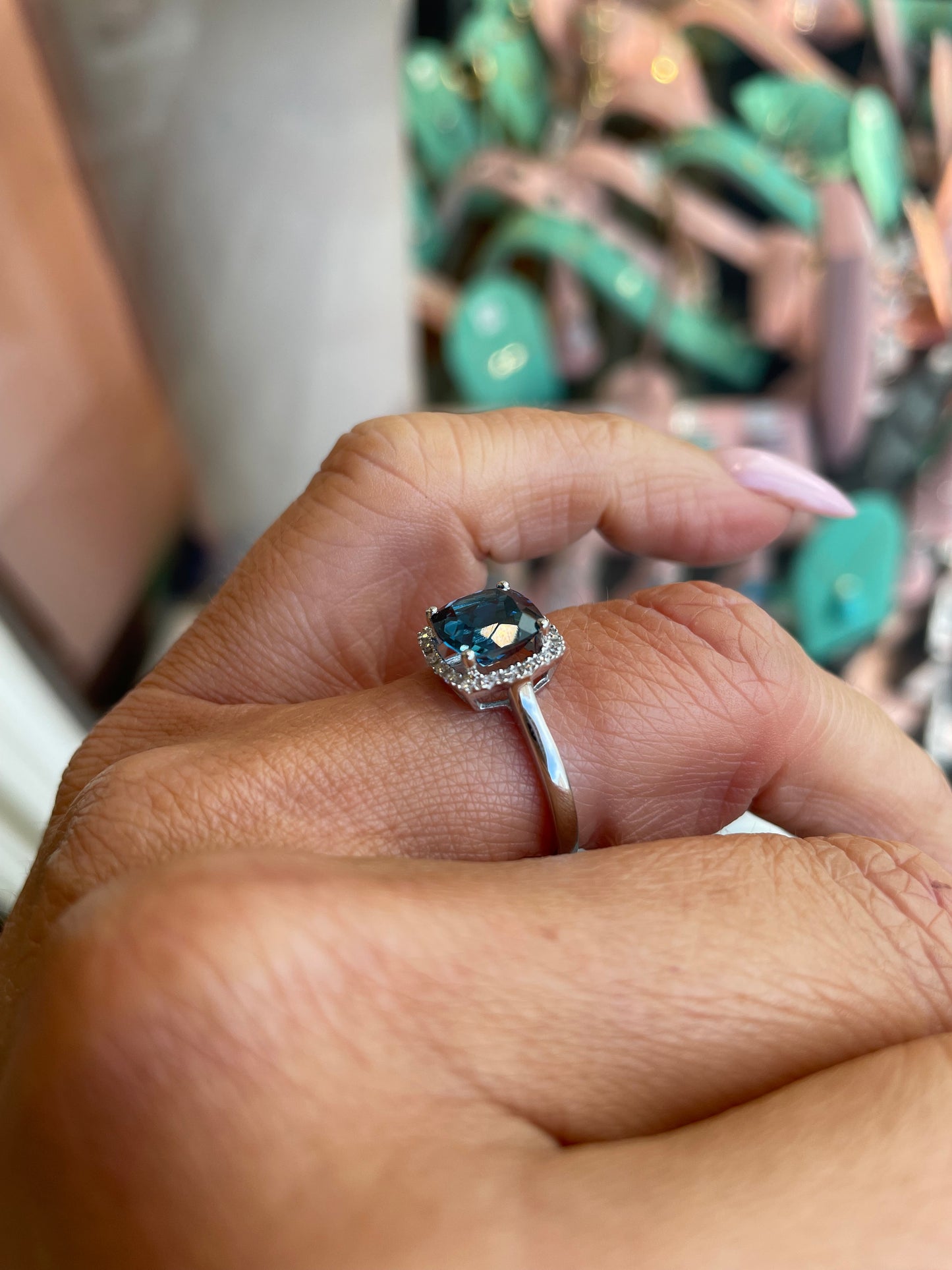 Herbert 9ct white gold cushion cut London Blue Topaz and diamond ring, featuring a blue gemstone with diamond accents.