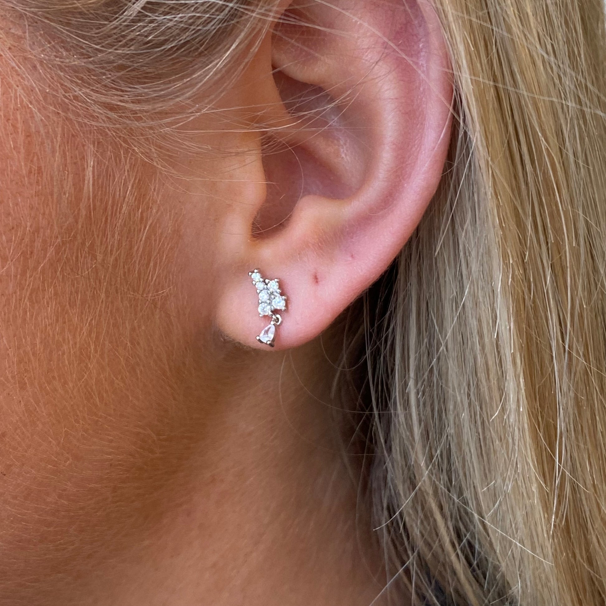Silver Pretty CZ Drop Earrings by Comero featuring sparkling cubic zirconia stones and elegant dangling design.