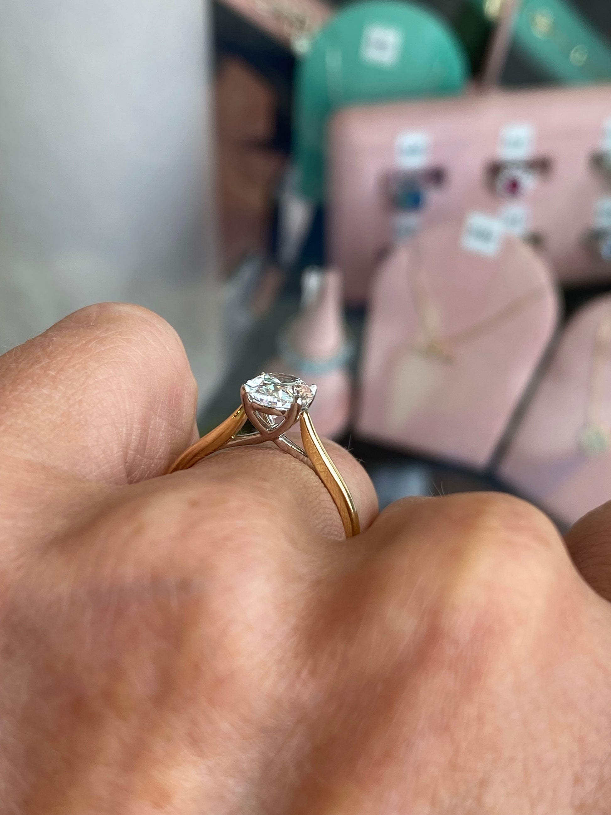18ct gold oval solitaire engagement ring with 1.51ct certificated lab diamond, featuring a classic and elegant design by Domino.