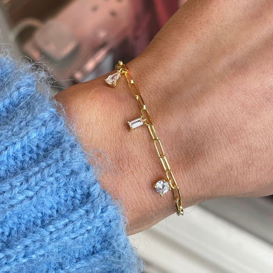 Sunshine CZ Drops bracelet by Comero featuring gold-tone chain with sparkling cubic zirconia drops.