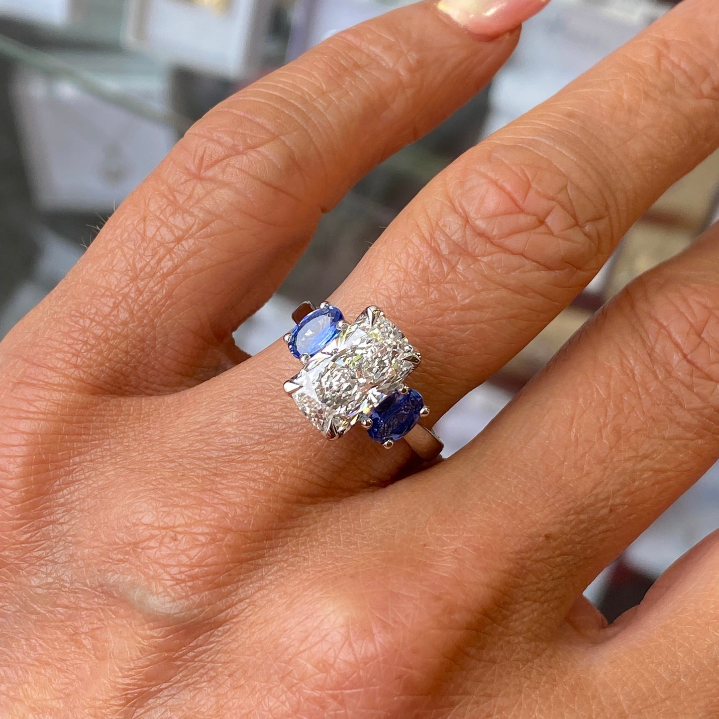 Platinum Elongated Cushion & Sapphire Trilogy Ring - John Ross Jewellers