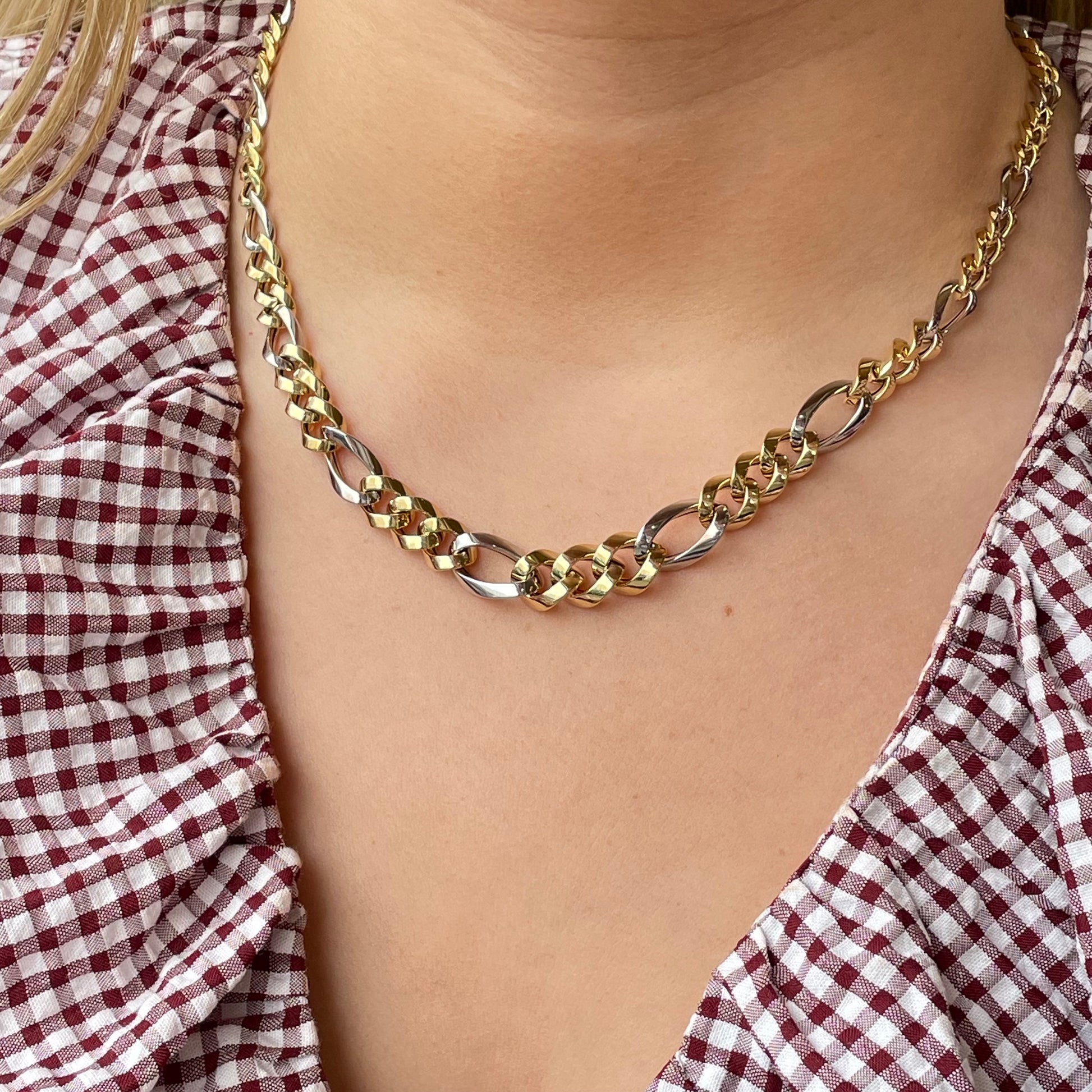 9ct gold and silver two-tone chunky Figaro necklace by Mark Milton, featuring bold interlinked chain links.