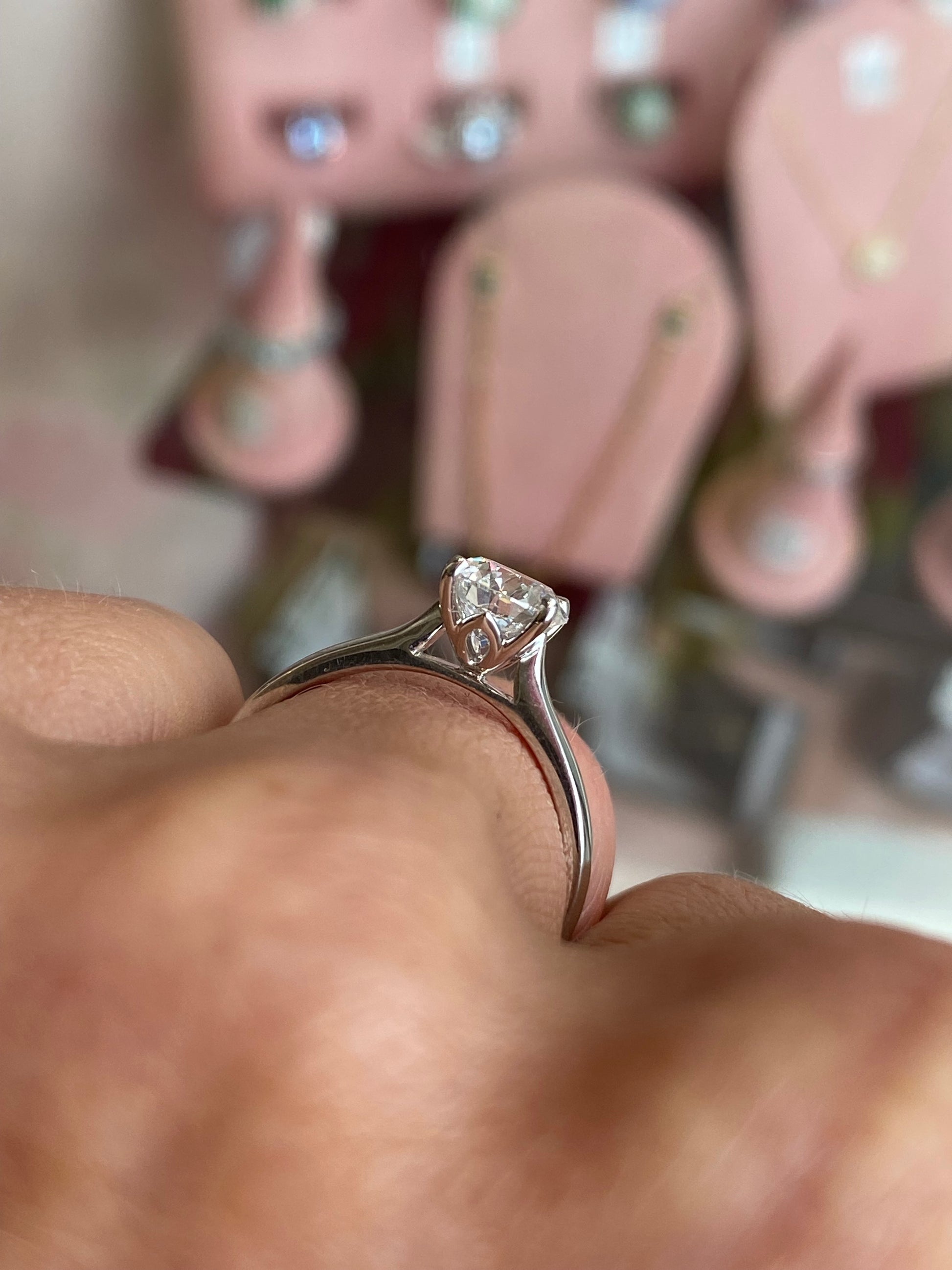 TCA platinum solitaire engagement ring with a 1.12ct certificated lab diamond, showcasing a classic design with a solitaire setting.