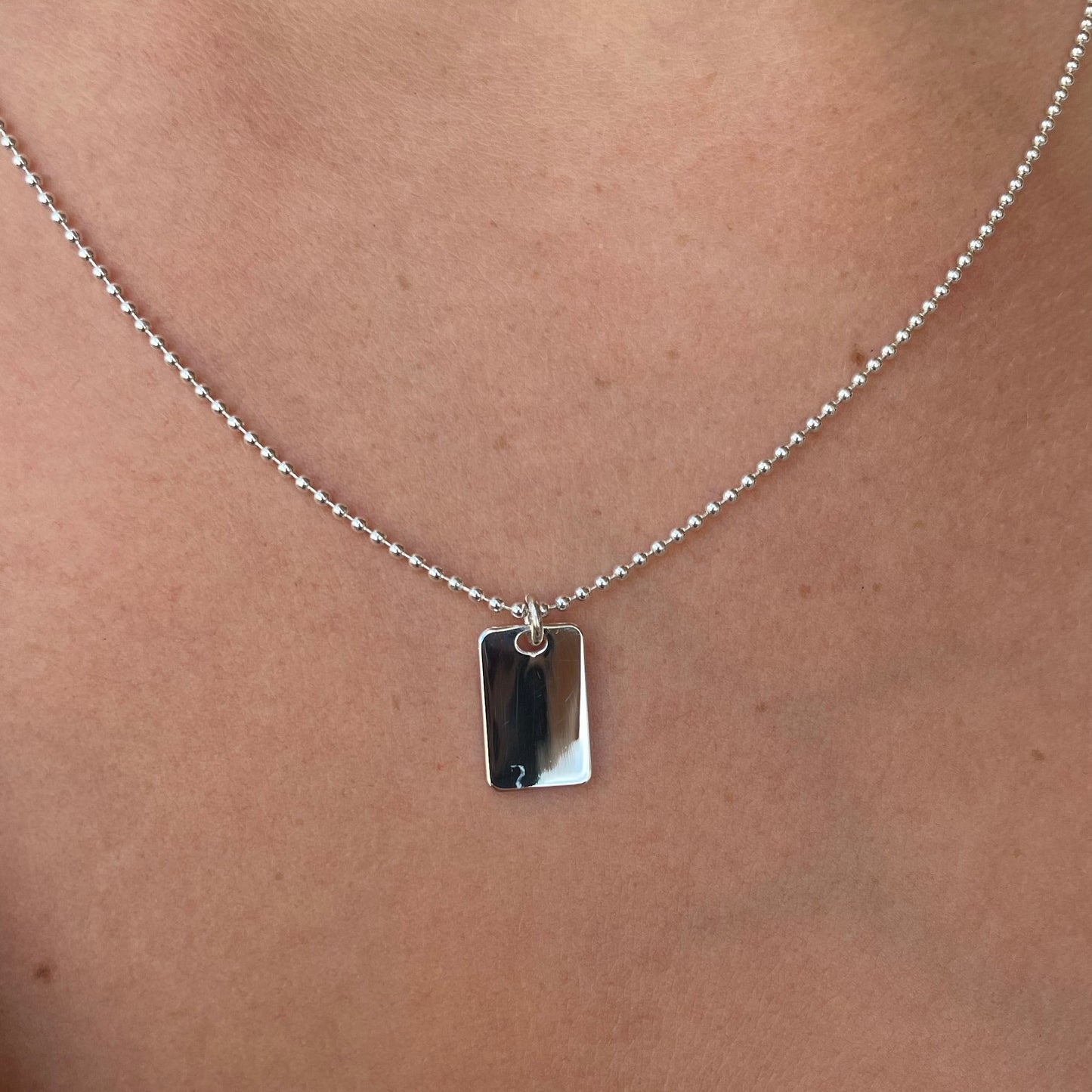 Silver CME double tag pendant necklace with bead chain, mini size, featuring two silver tags hanging on a delicate chain.