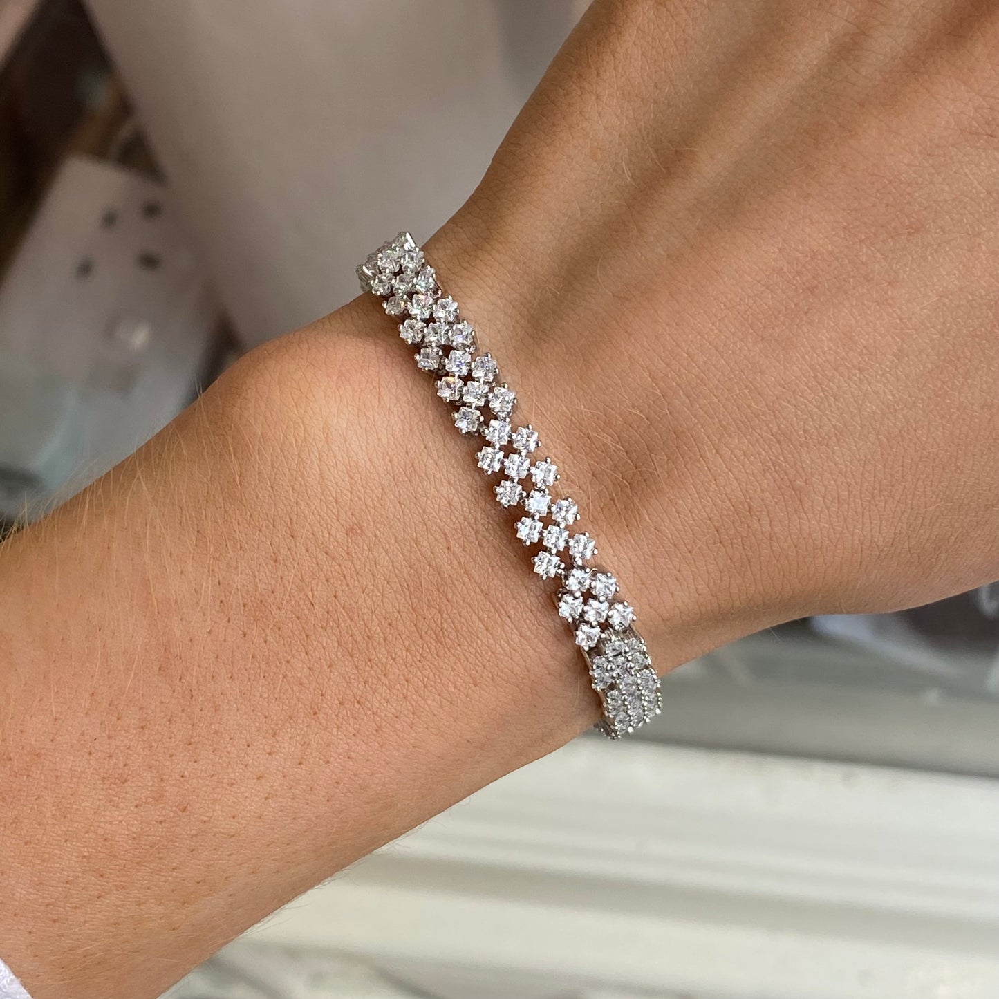 Silver Adira bracelet by Comero featuring a sleek, polished design with intricate detailing and a secure clasp.