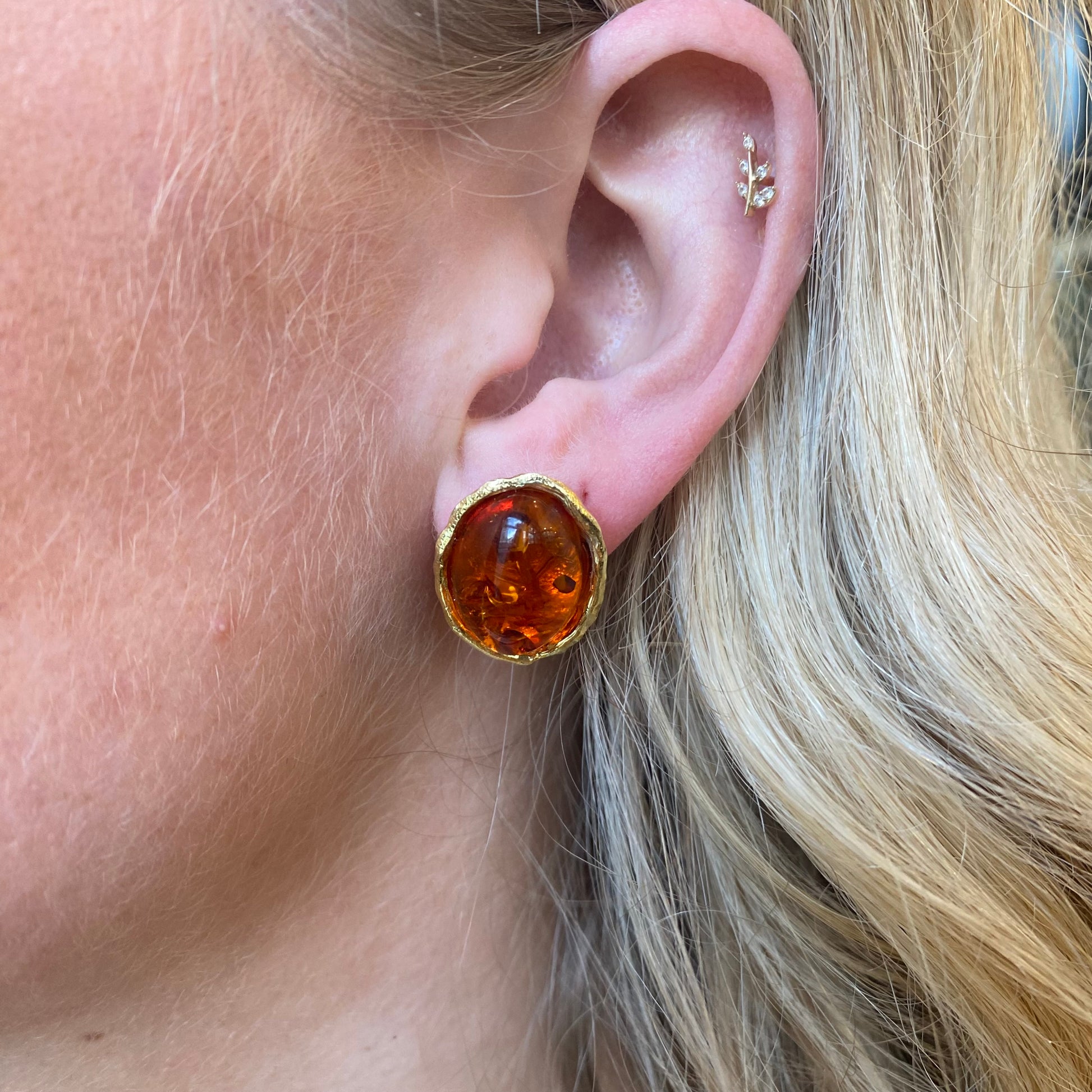Bruno Baroque Amber stud earrings featuring 22mm x 16mm amber stones with intricate gold-tone settings.