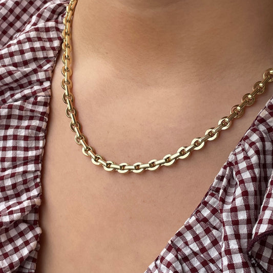9ct gold chunky contemporary link necklace by Mark Milton, featuring bold interlocking chain links on a white background.