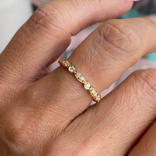 Lanza 18ct gold diamond wedding band with 0.35ct diamonds, decorative eternity ring showcasing sparkling diamonds and gold setting.