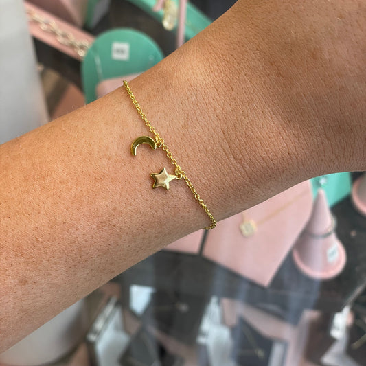 THC Sunshine Moon & Star Charm Bracelet featuring celestial charms and elegant design on a silver-tone bracelet.