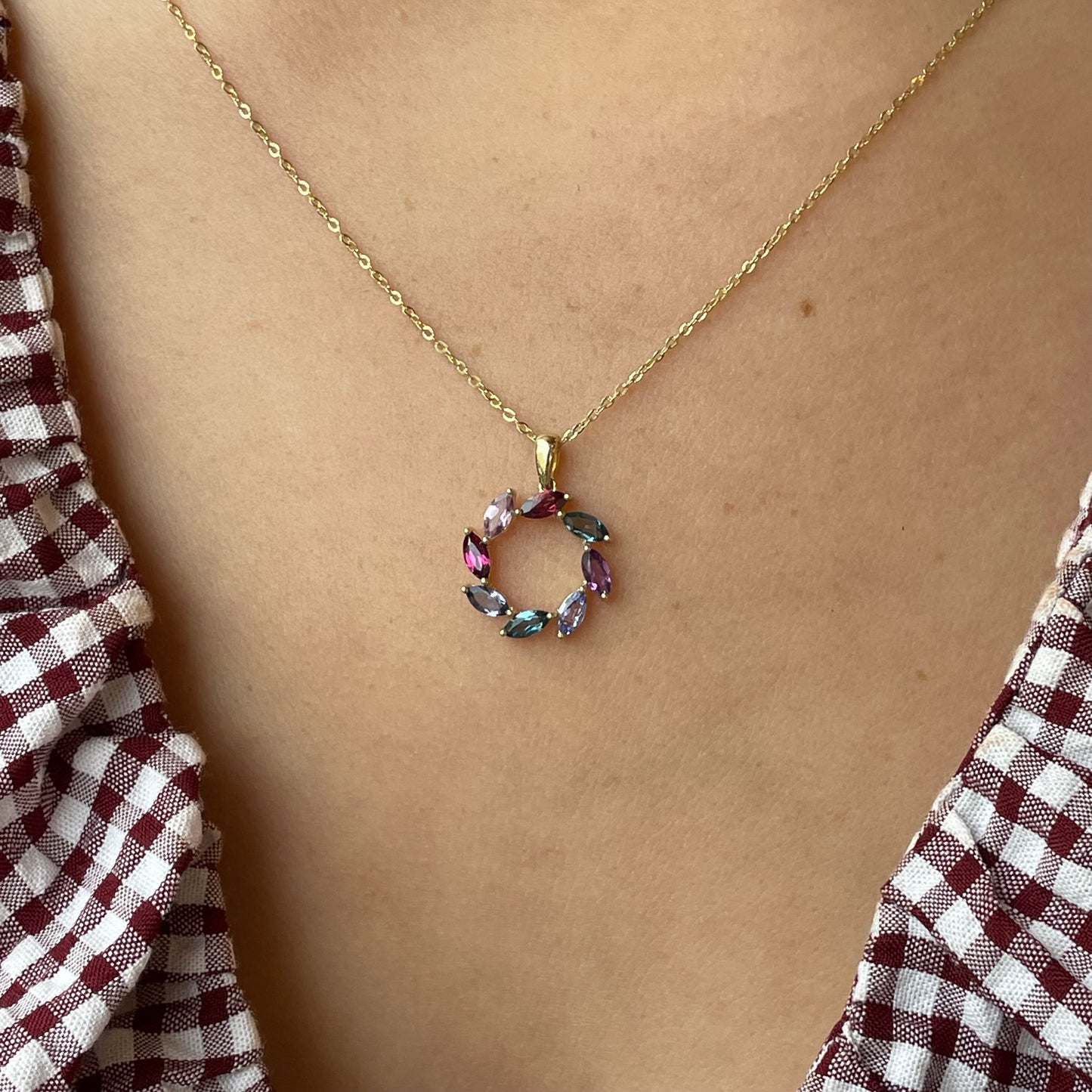 Mark Milton 9ct gold multi-gemstone eternity necklace with vibrant gemstones and delicate chain, showcasing elegant jewelry design.