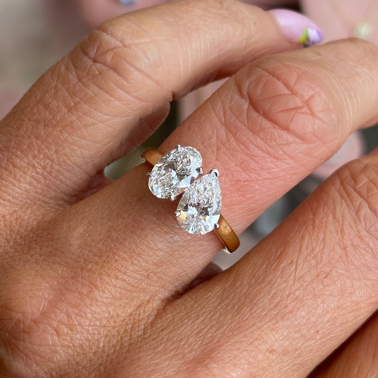 18ct gold Moi et Toi engagement ring by TCA featuring a two-stone design and a polished finish on a plain background.