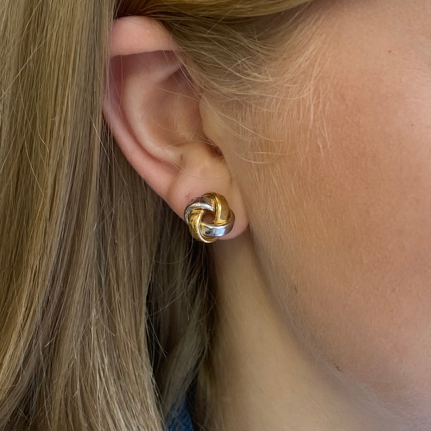 Stubbs 9ct gold three-tone chunky knot stud earrings featuring intertwined gold, rose, and white gold designs.