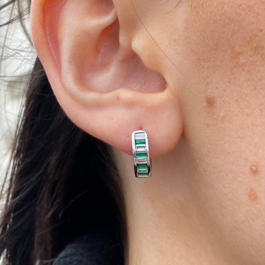 Silver Baguette CZ Hoop Earrings with emerald green stones by Insignia, showcasing a stylish hoop design with sparkling accents.