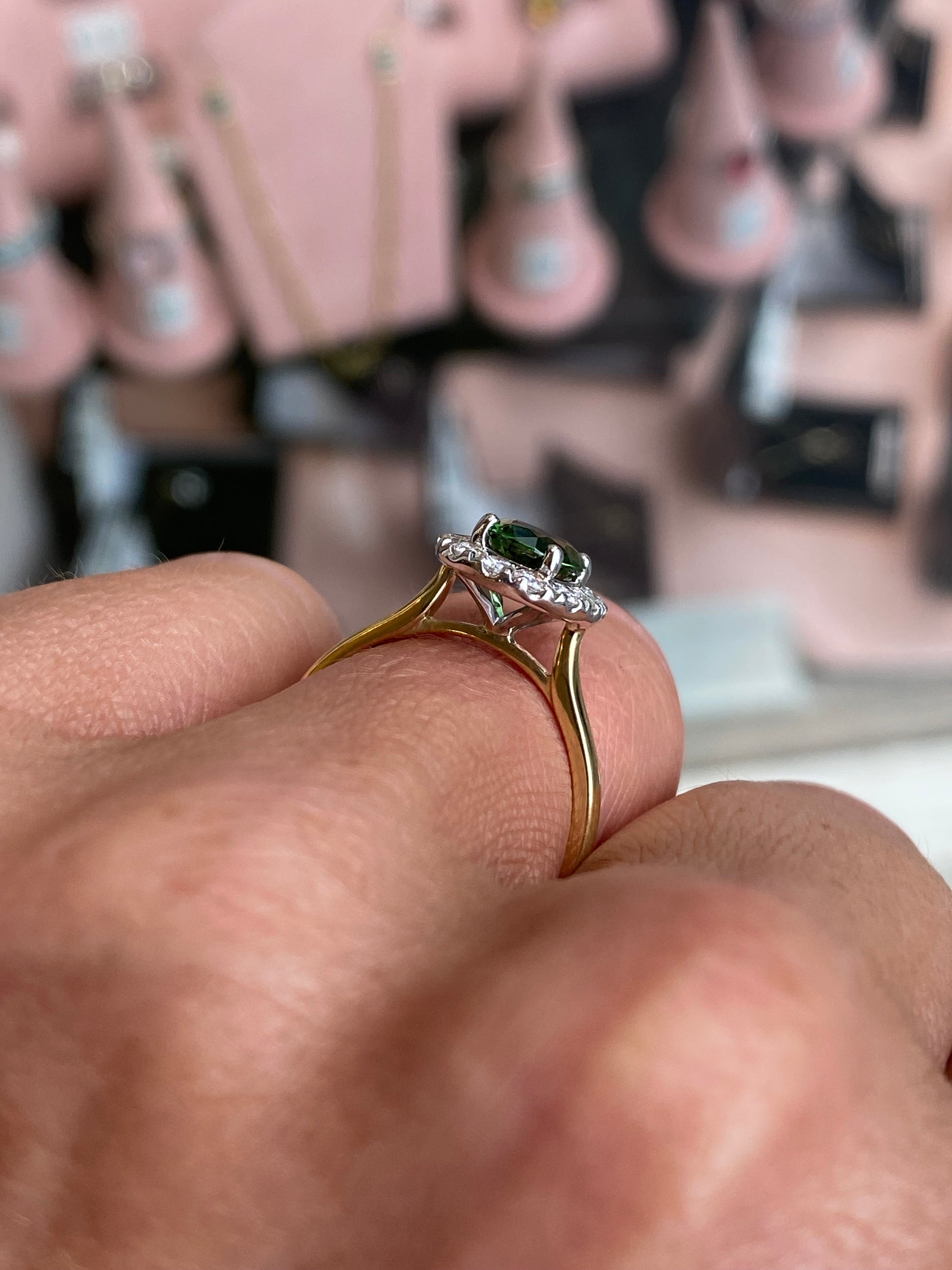 18ct gold ring featuring chrome tourmaline and diamond accents by FEU, showcasing a detailed close-up of the elegant jewelry design.