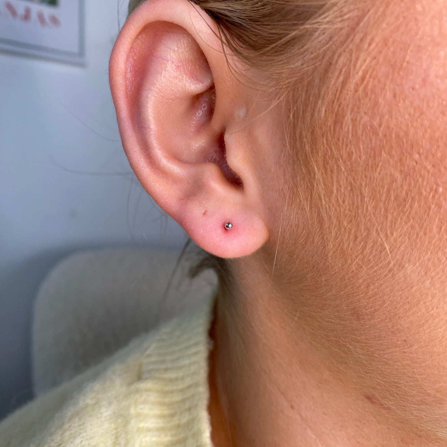 Kid's silver Nano Ball stud earrings by Comero featuring small, shiny silver balls suitable for children's delicate ears.