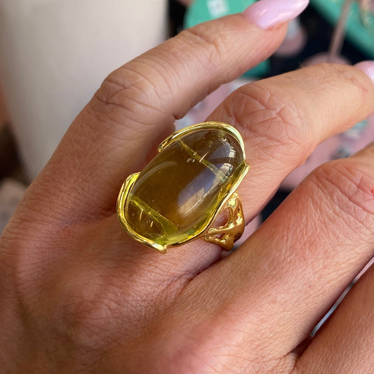 Bruno Lime Amber Nugget Ring showing a gold ring with lime amber gemstone details and textured design.