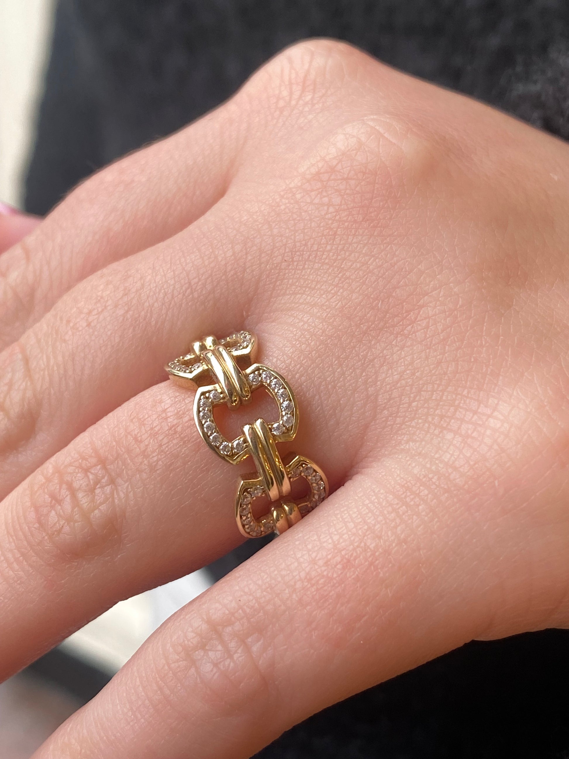 Comero Sunshine CZ Pretty Link Ring featuring sparkling cubic zirconia and a sleek, elegant band for stylish wear.