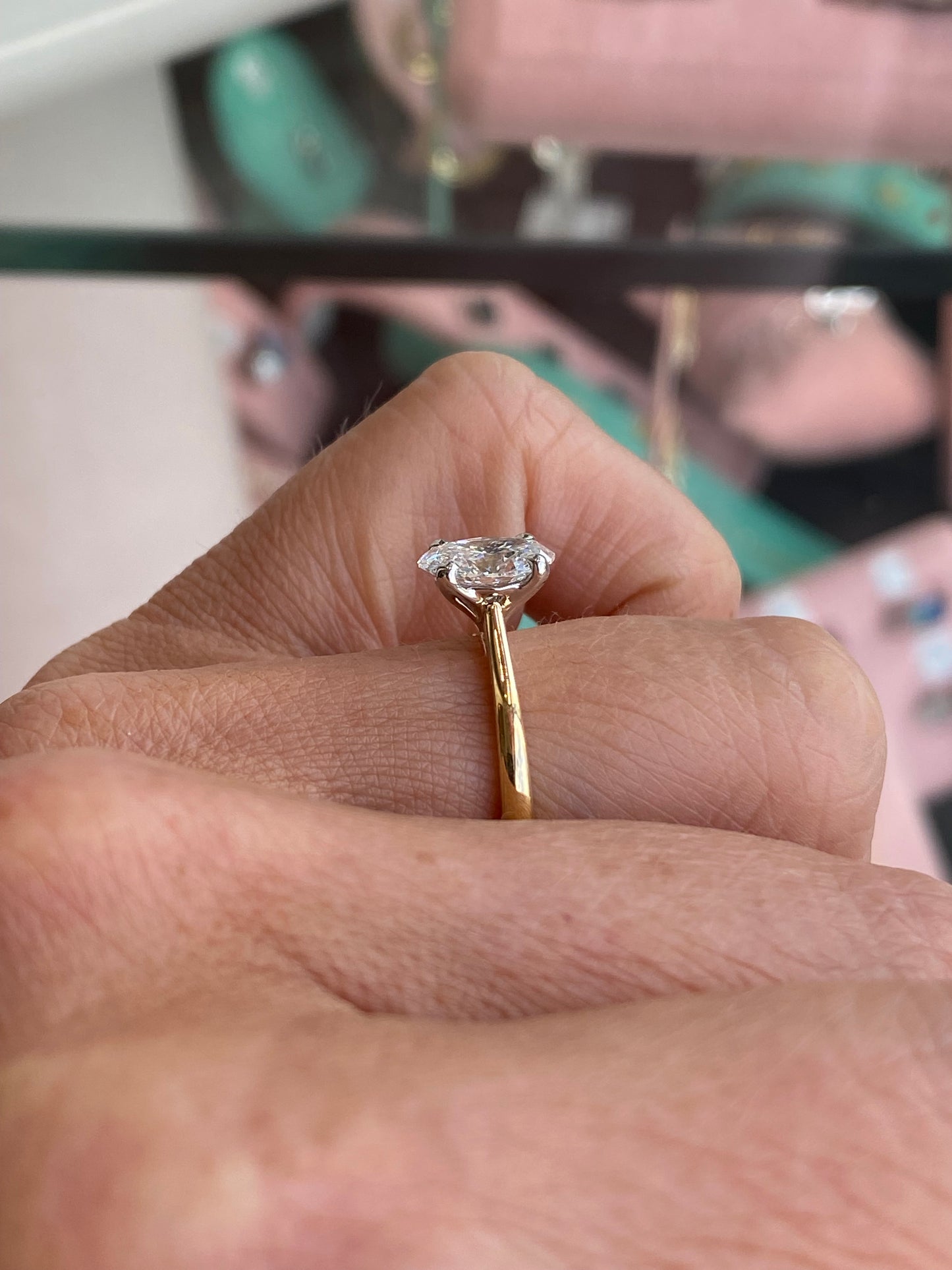 18ct gold oval solitaire engagement ring with 1.27ct certified diamond, showcasing a classic and elegant design from Prima.