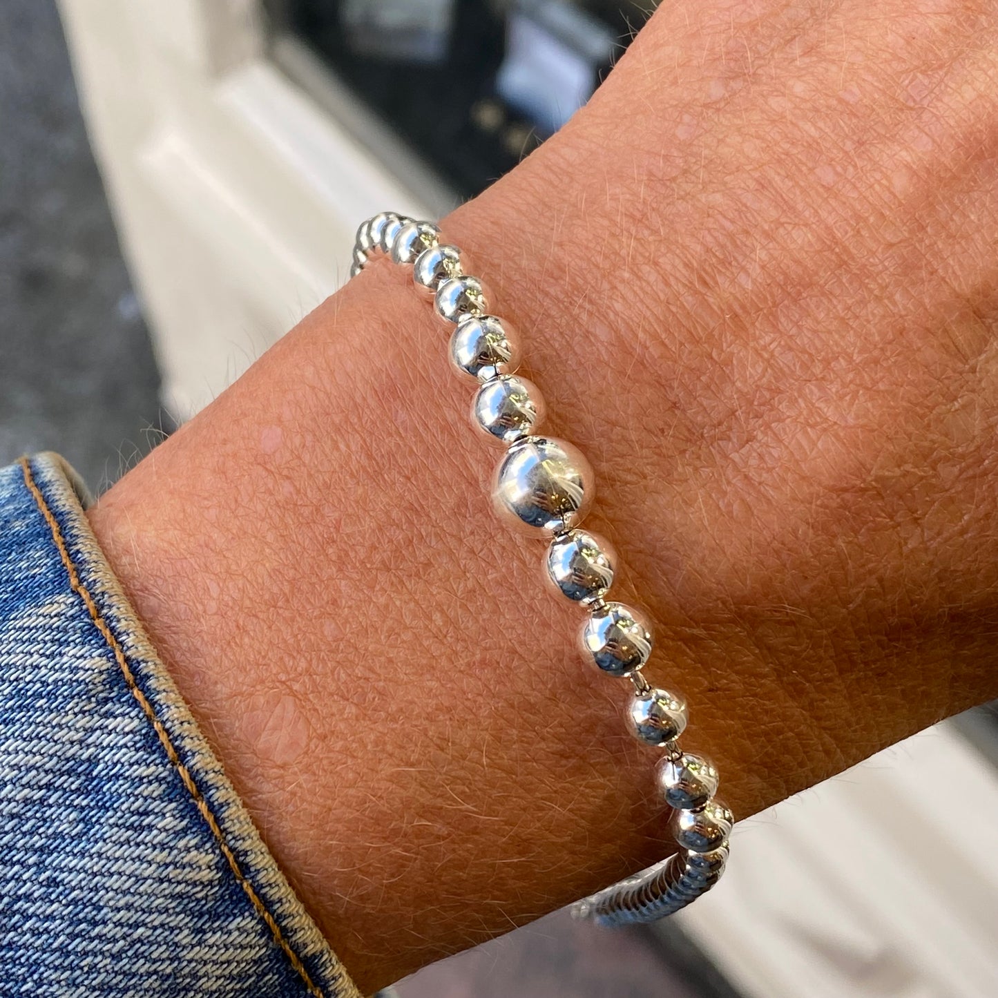 Silver Graduated Beaded Bracelet