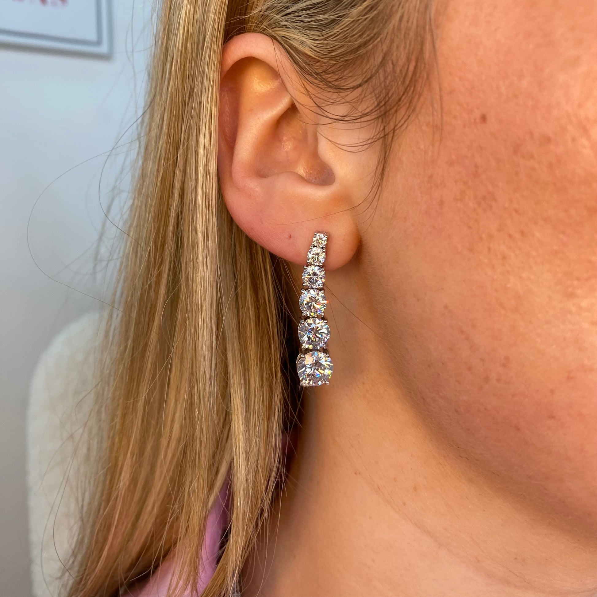 Silver Jessie Drop Earrings by Comero featuring sleek, dangling earring design with polished silver finish.
