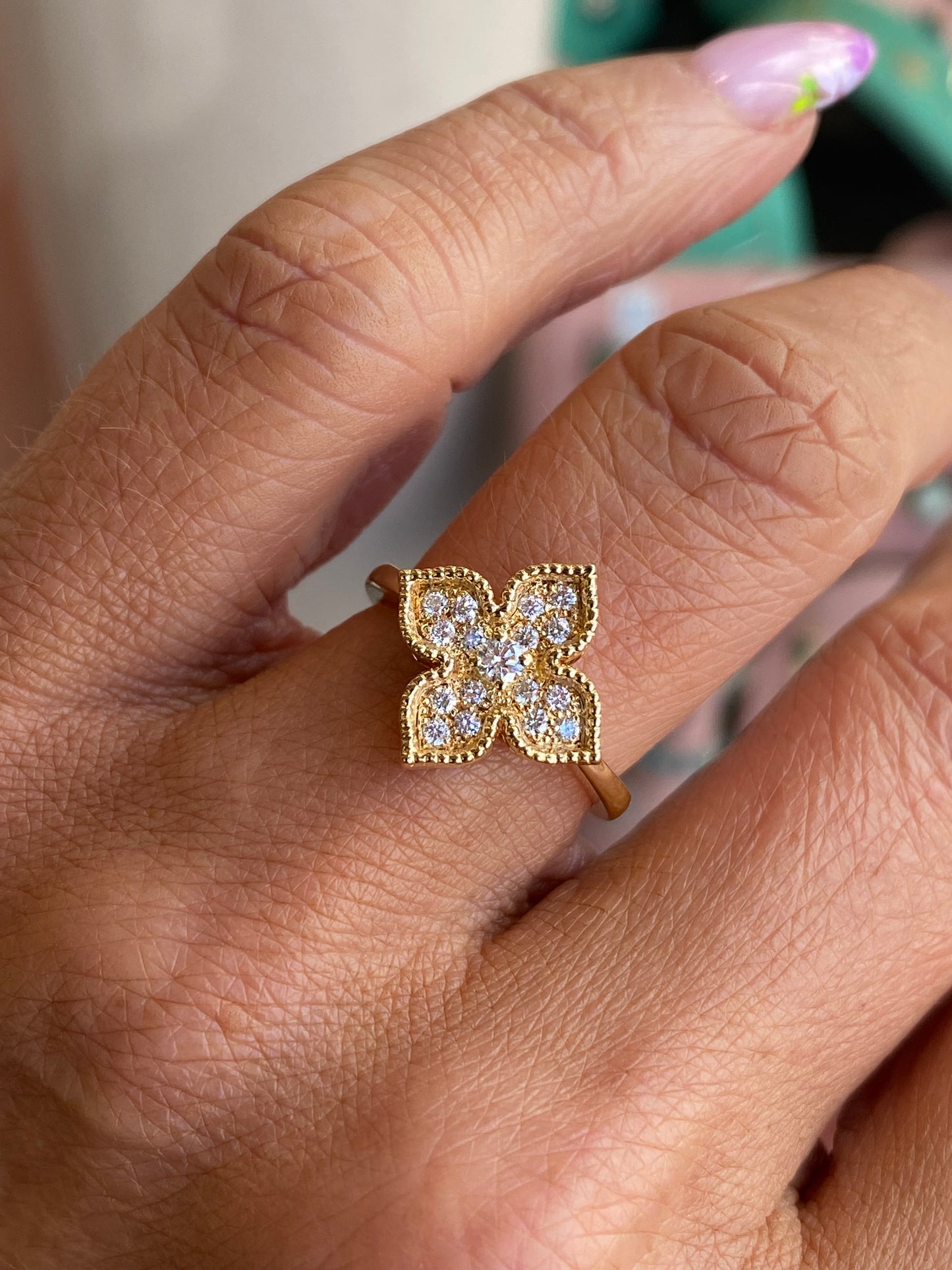 18ct gold Venetian quatrefoil diamond ring by Lanza, featuring intricate design and sparkling diamonds on a polished gold band.