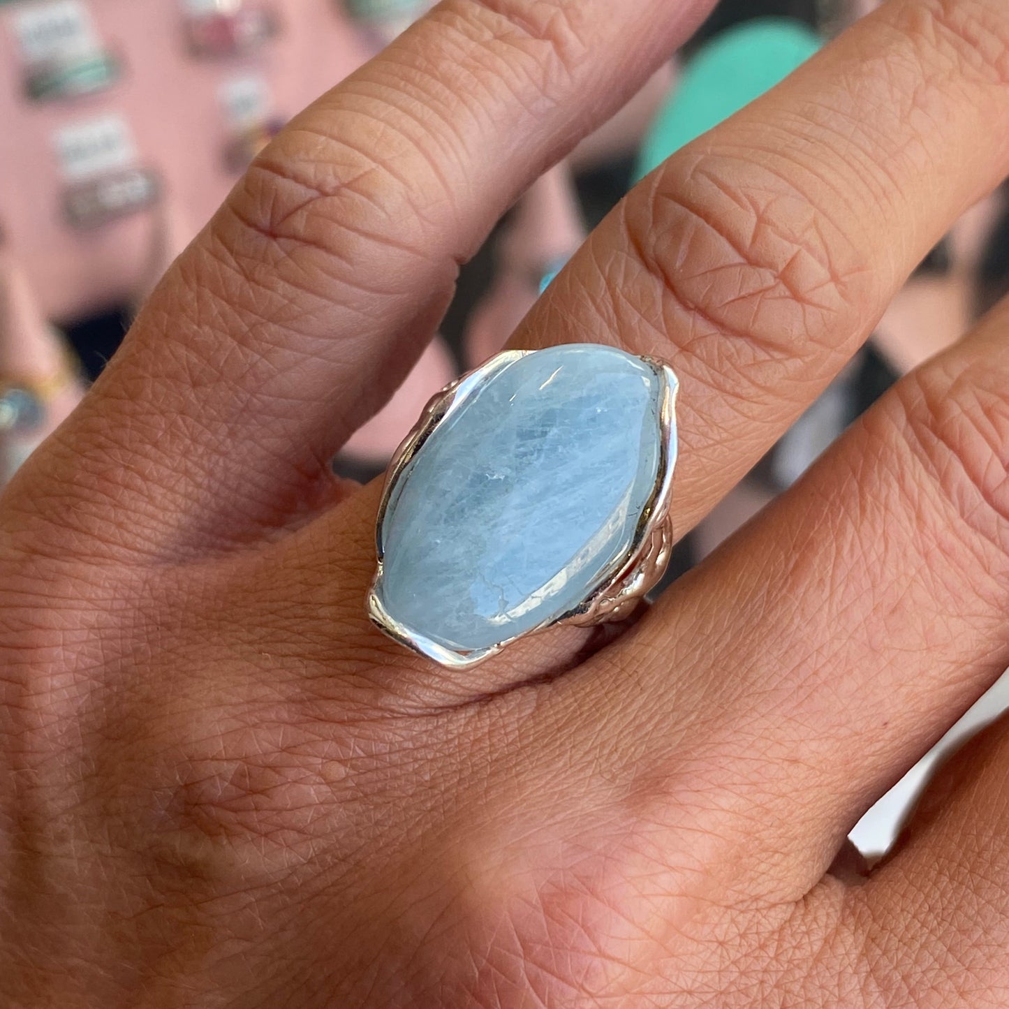 Bruno silver ring featuring a silky aquamarine nugget gemstone with a smooth, polished finish.