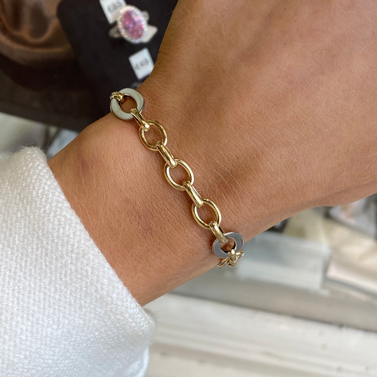 Mark Milton 9ct gold elongated oval link bracelet with two-tone finish, featuring a stylish and elegant jewelry design.