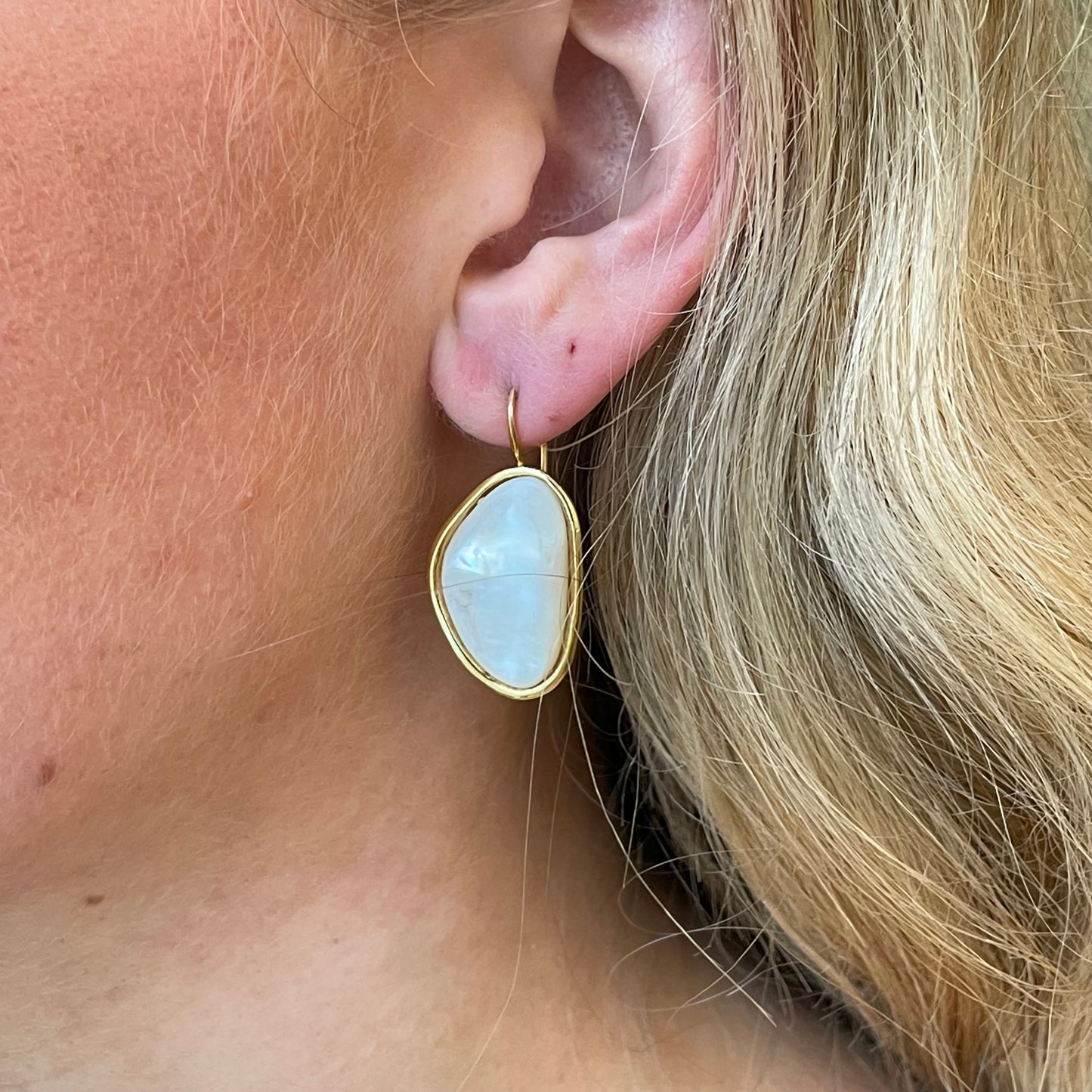 Bruno mother of pearl drop earrings, 32mm x 18mm, featuring elegant iridescent pearl drops on silver hooks.