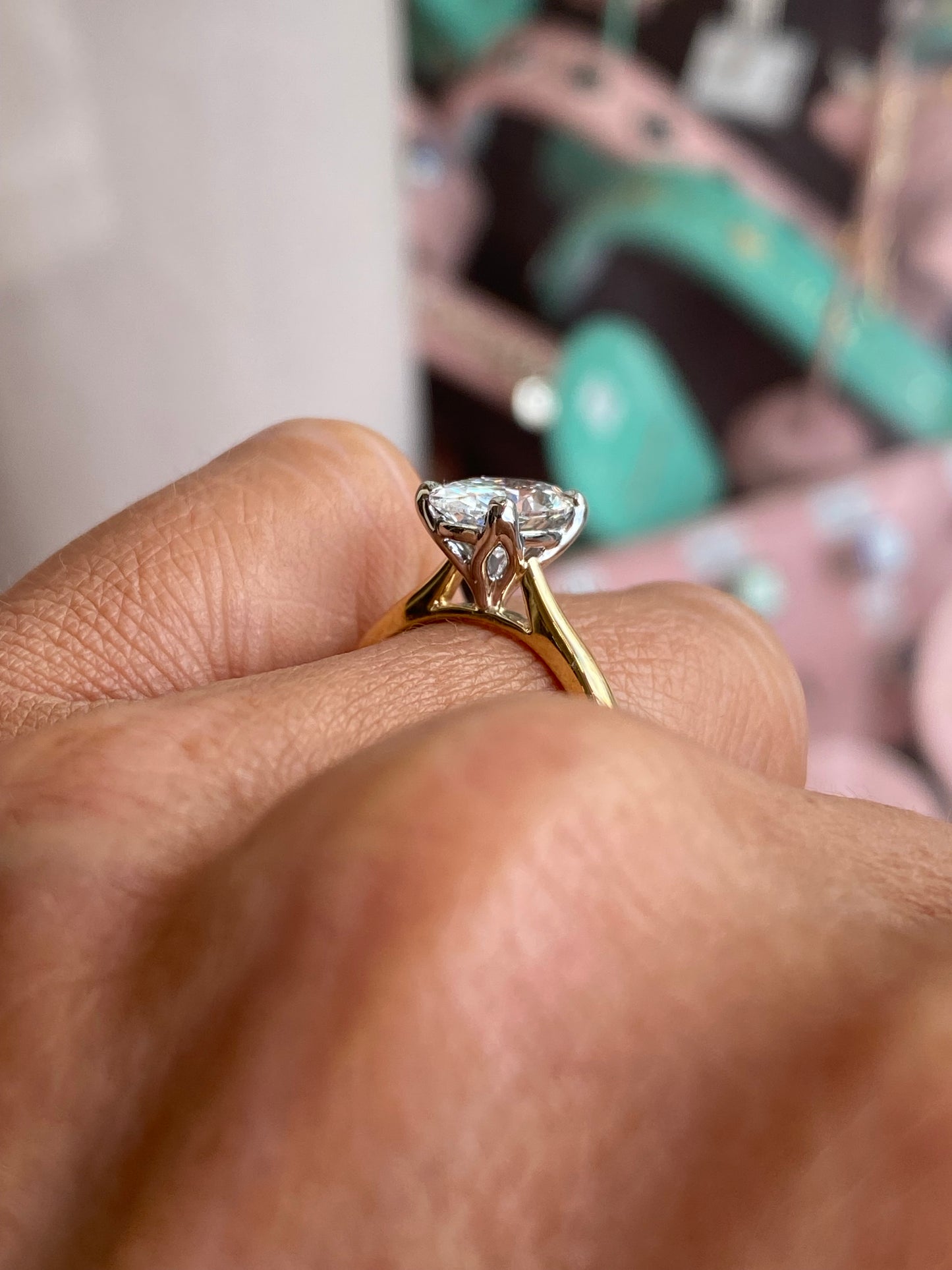 18ct gold oval solitaire engagement ring by Prima with 1.72ct certified diamond, showcasing a classic and elegant design.