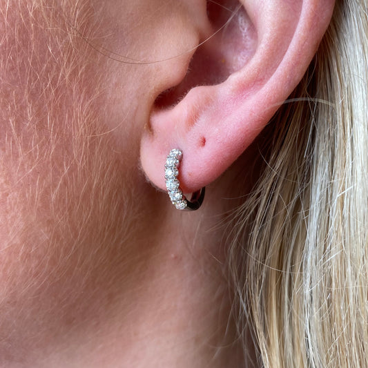 Lanza 18ct white gold diamond hoop earrings with 0.41ct sparkling diamonds, showcasing elegant hoop design and luxurious craftsmanship.