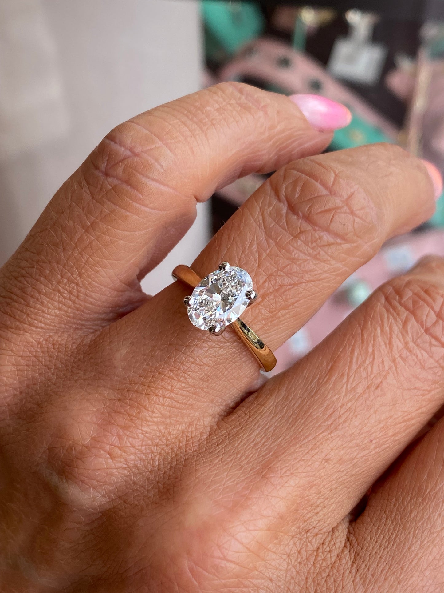 Prima 18ct gold oval solitaire engagement ring with 1.72ct certificated diamond, featuring a classic and elegant design.
