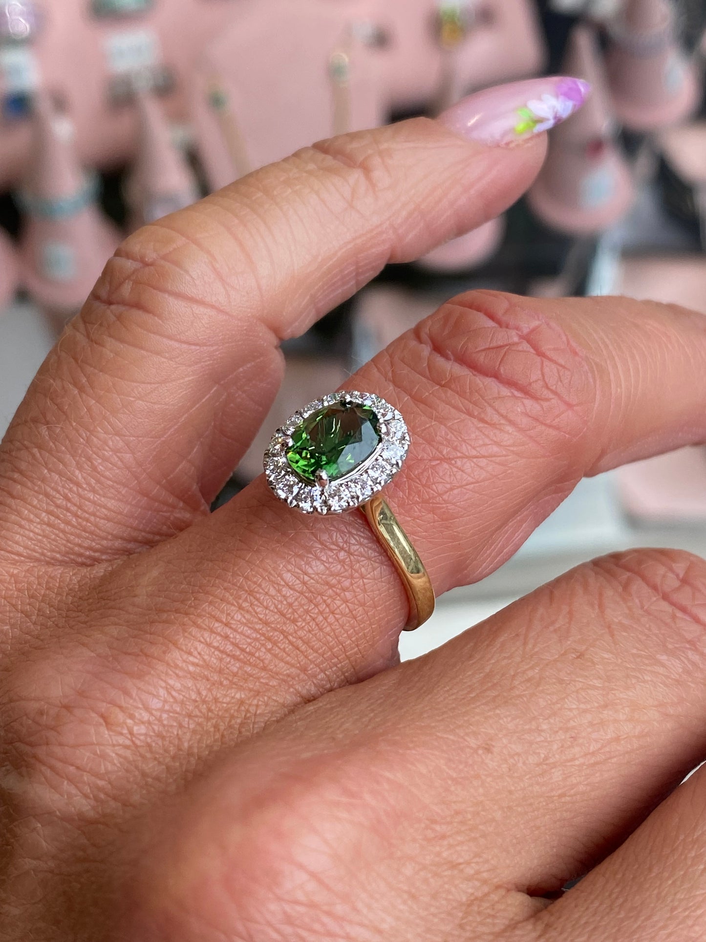 18ct gold FEU ring featuring chrome tourmaline and diamond accents, showcasing a elegant and sparkling jewelry design.