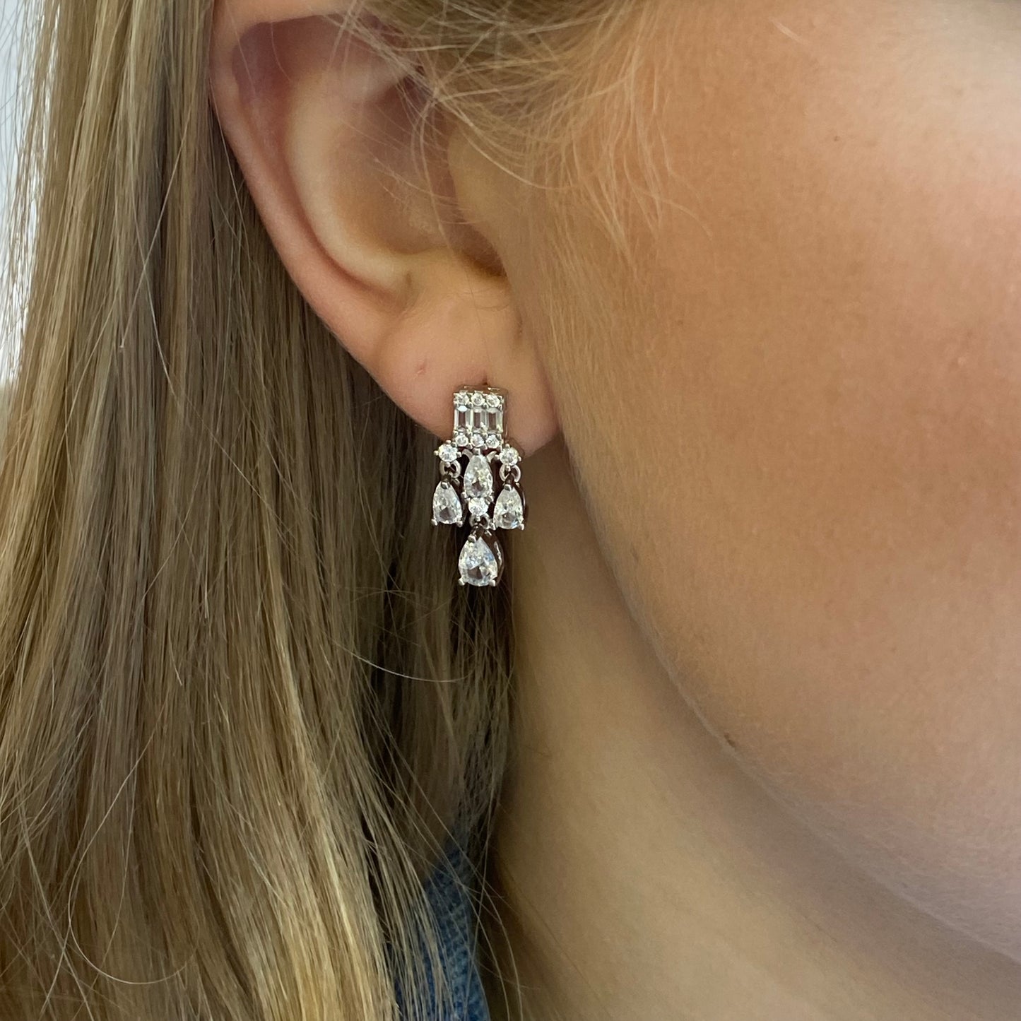 Silver Minerva Drop Earrings by Comero featuring elegant drop design and polished silver finish.