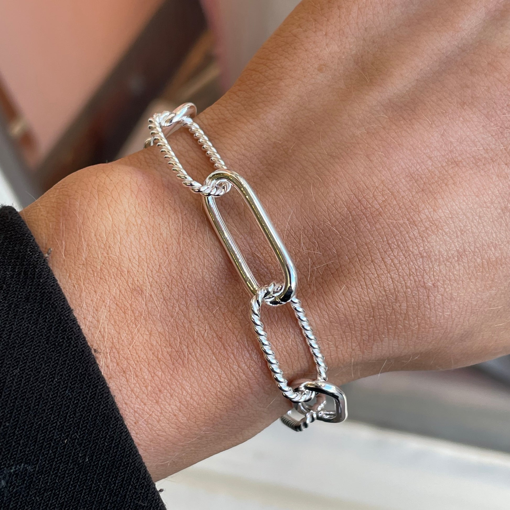 Silver long link bracelet by Insignia featuring 20cm of interconnected shiny silver links.