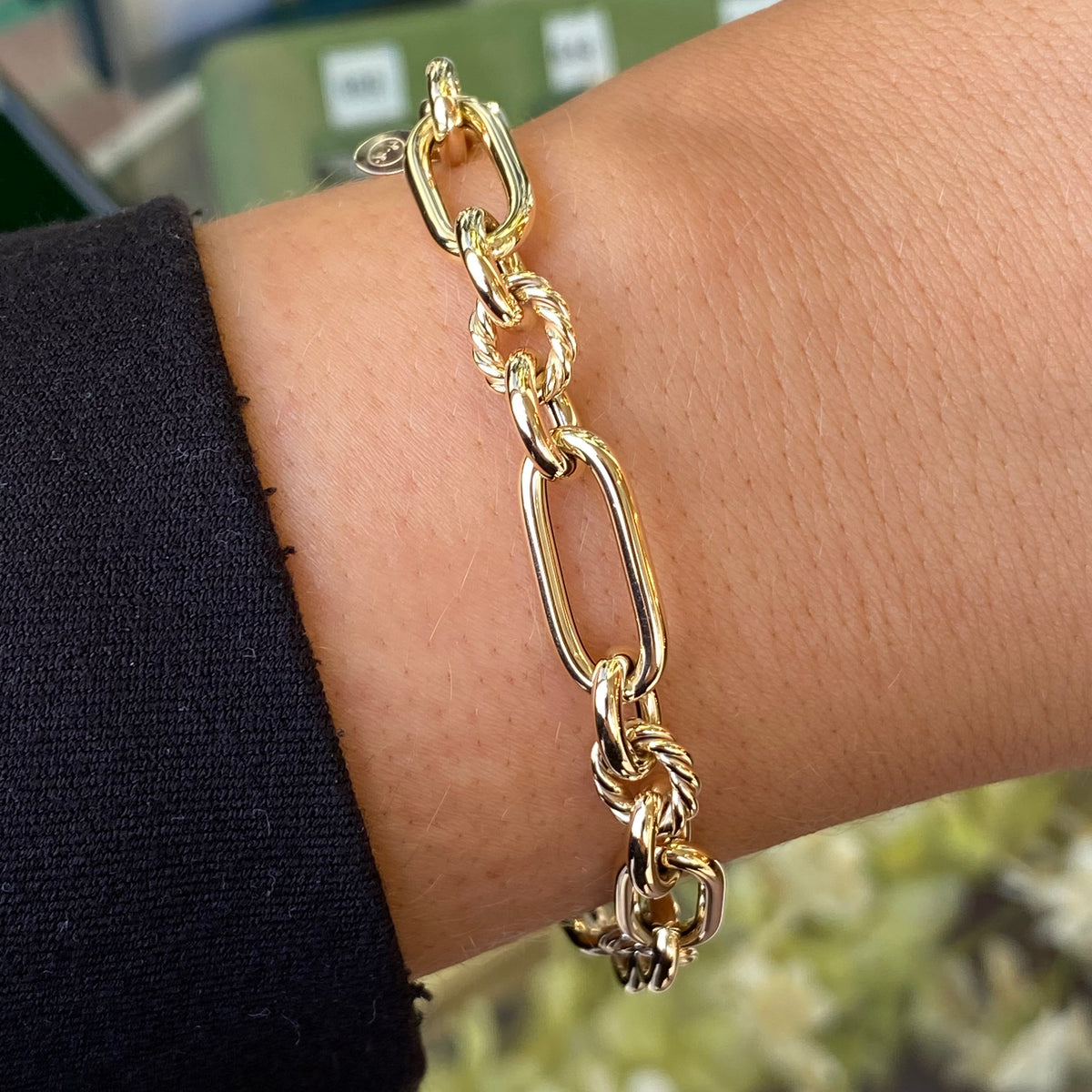 9ct gold chunky mixed link bracelet by Mark Milton, featuring bold interconnected links in a stylish jewelry design.