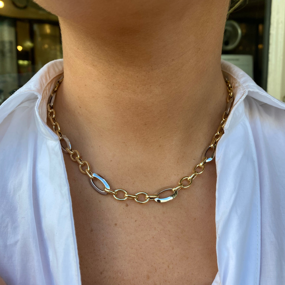 9ct gold elongated oval link necklace by Mark Milton featuring two-tone finish and intricate chain design.