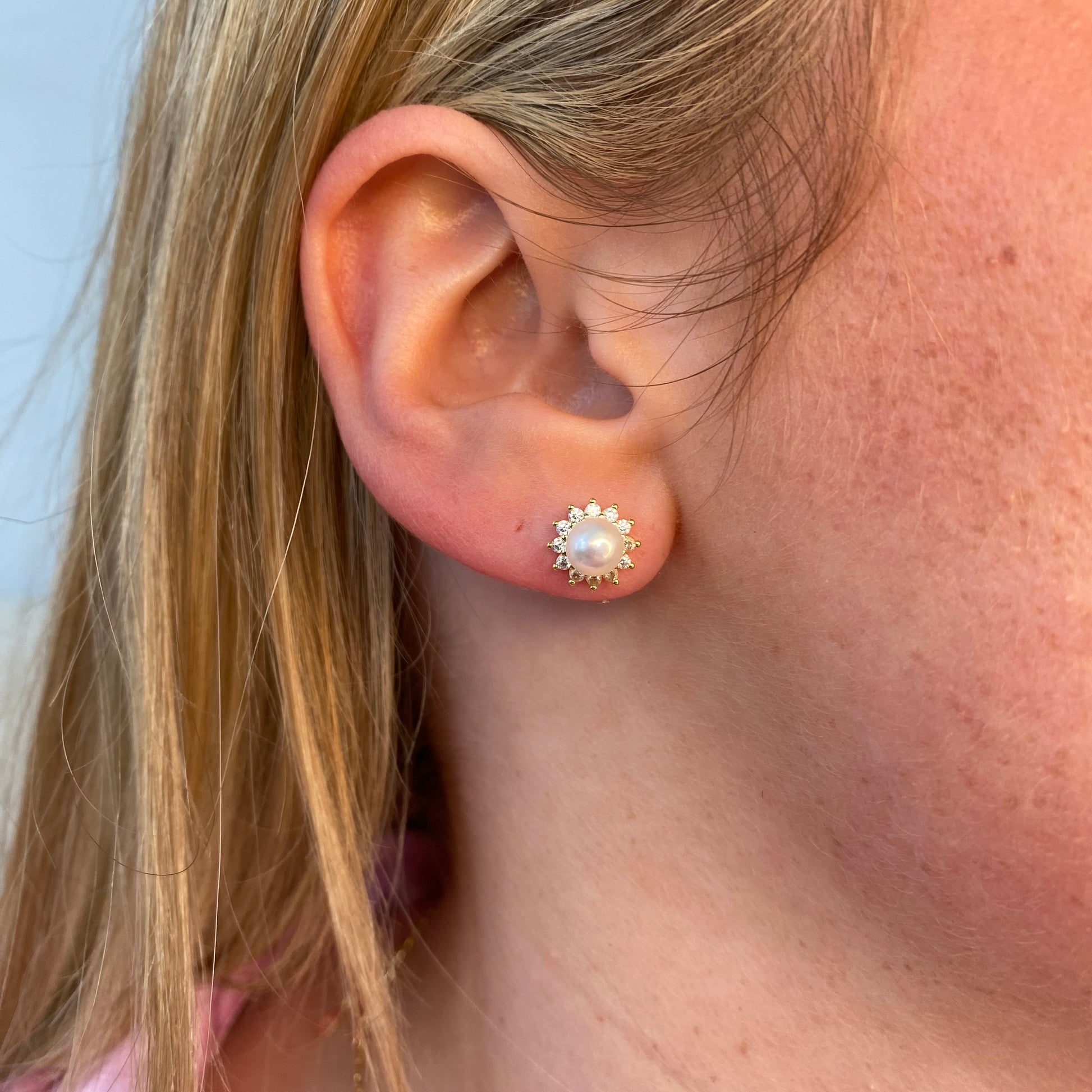Comero Sunshine Pearl and CZ halo earring and necklace set featuring sparkling jewelry with pearl and cubic zirconia accents.