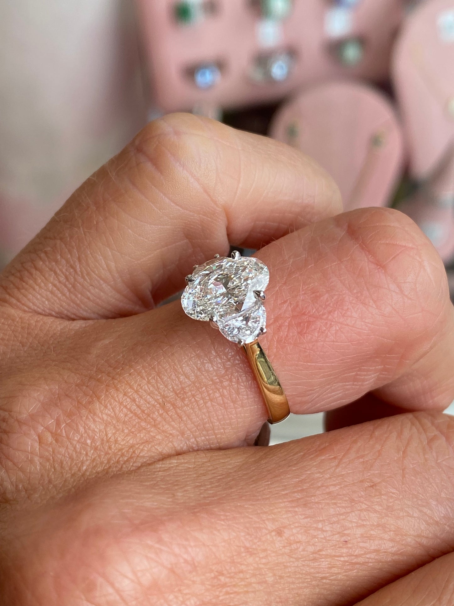 18ct gold trilogy engagement ring by TCA with a lab-certified 2.52ct central diamond and two side diamonds, elegant and sparkling.