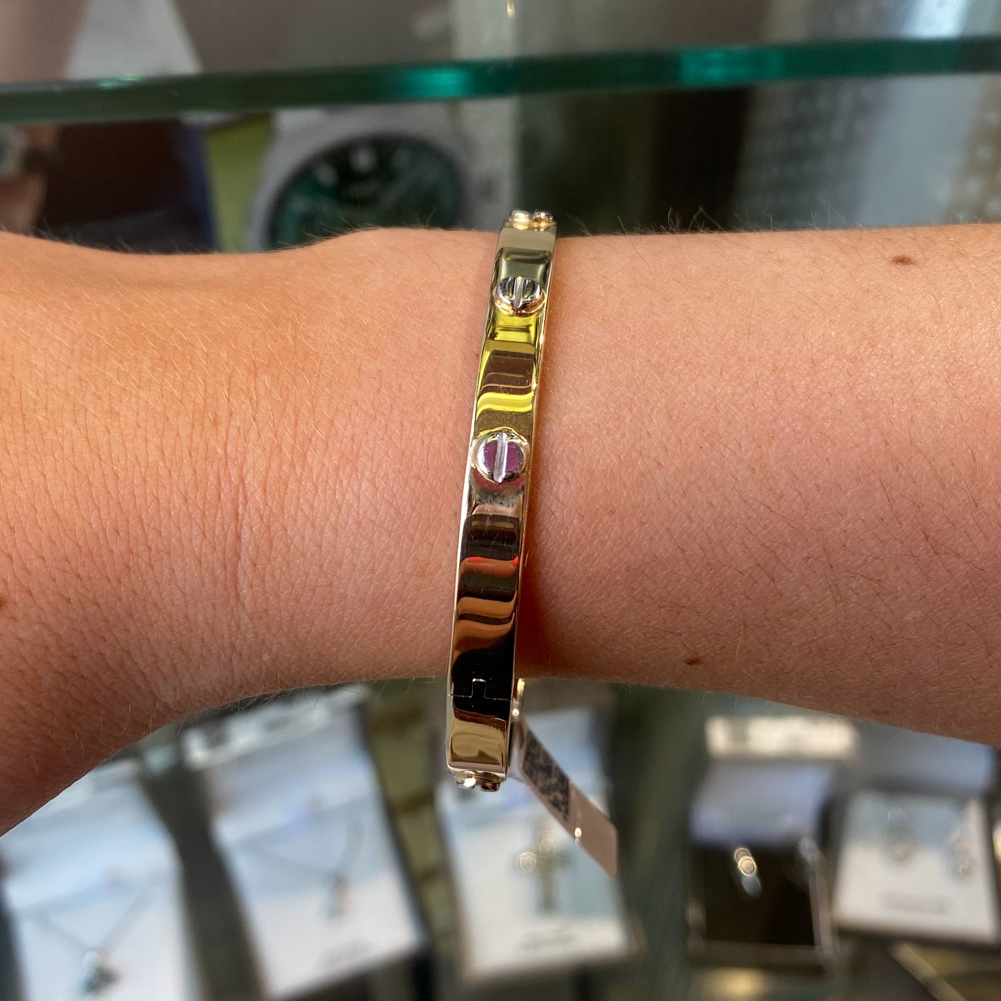 9ct Gold Solid Oval Bangle with White Gold Screws - John Ross Jewellers