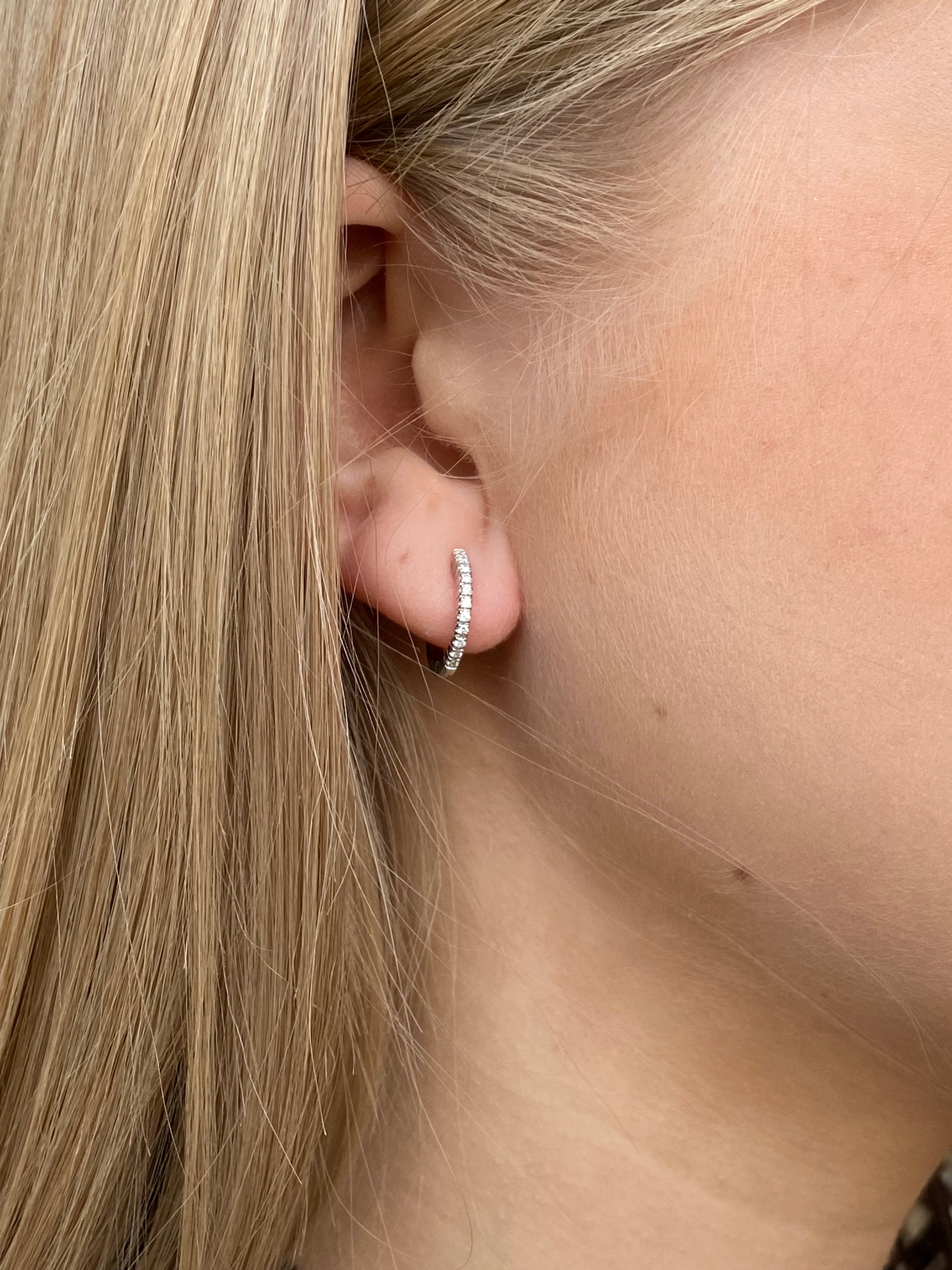 Mirco 18ct white gold diamond hoop earrings with 0.14ct sparkling diamonds, showcasing elegant jewelry design.