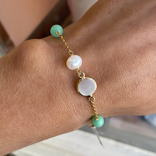 Bruno jade, pearl, and quartz bracelet featuring mixed gemstone beads on a stretch cord, stylish and elegant jewelry accessory.
