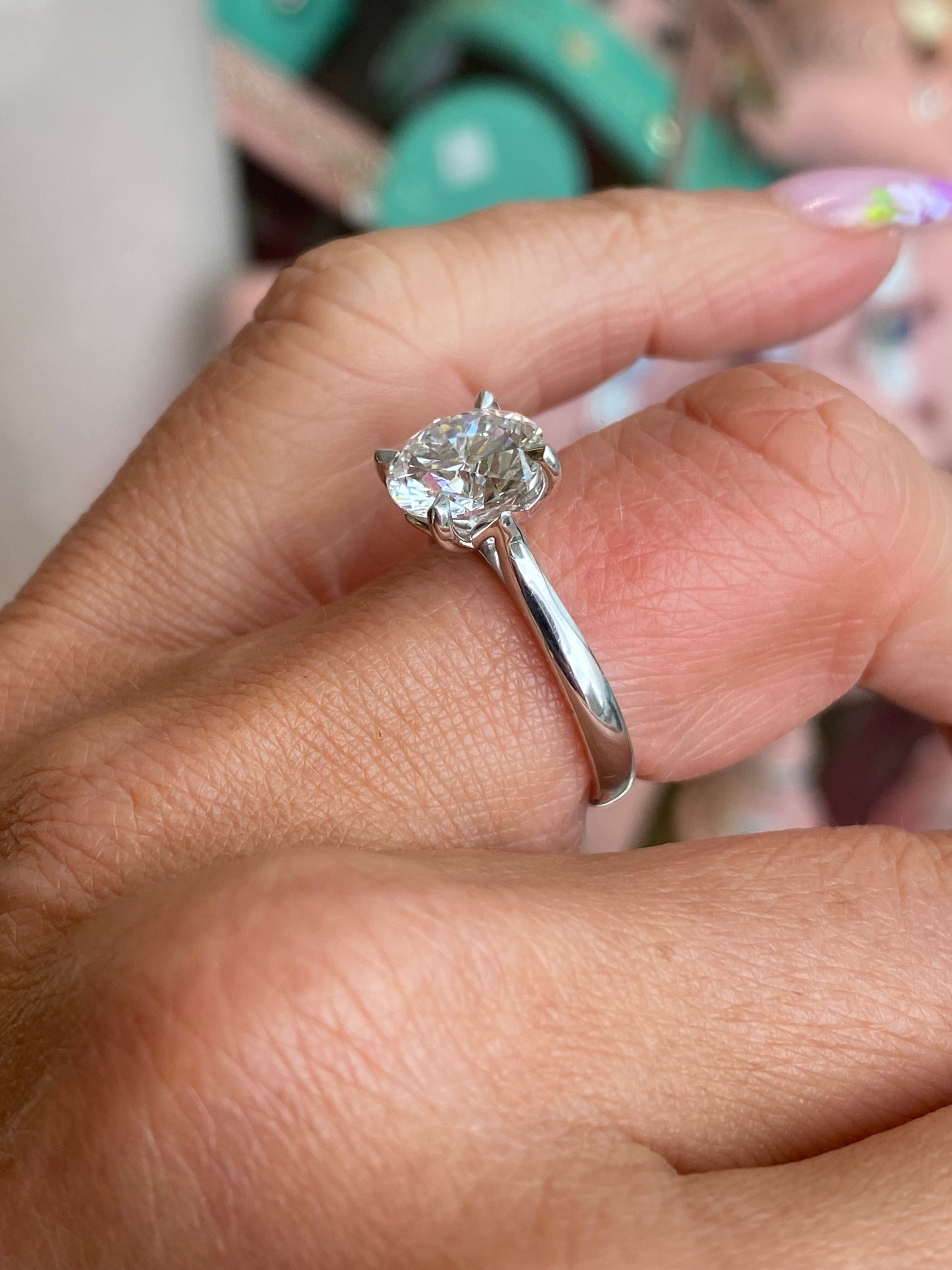 TCA platinum solitaire engagement ring featuring a 3.01ct certificated lab diamond, showcasing a sleek, elegant design with a central gemstone.