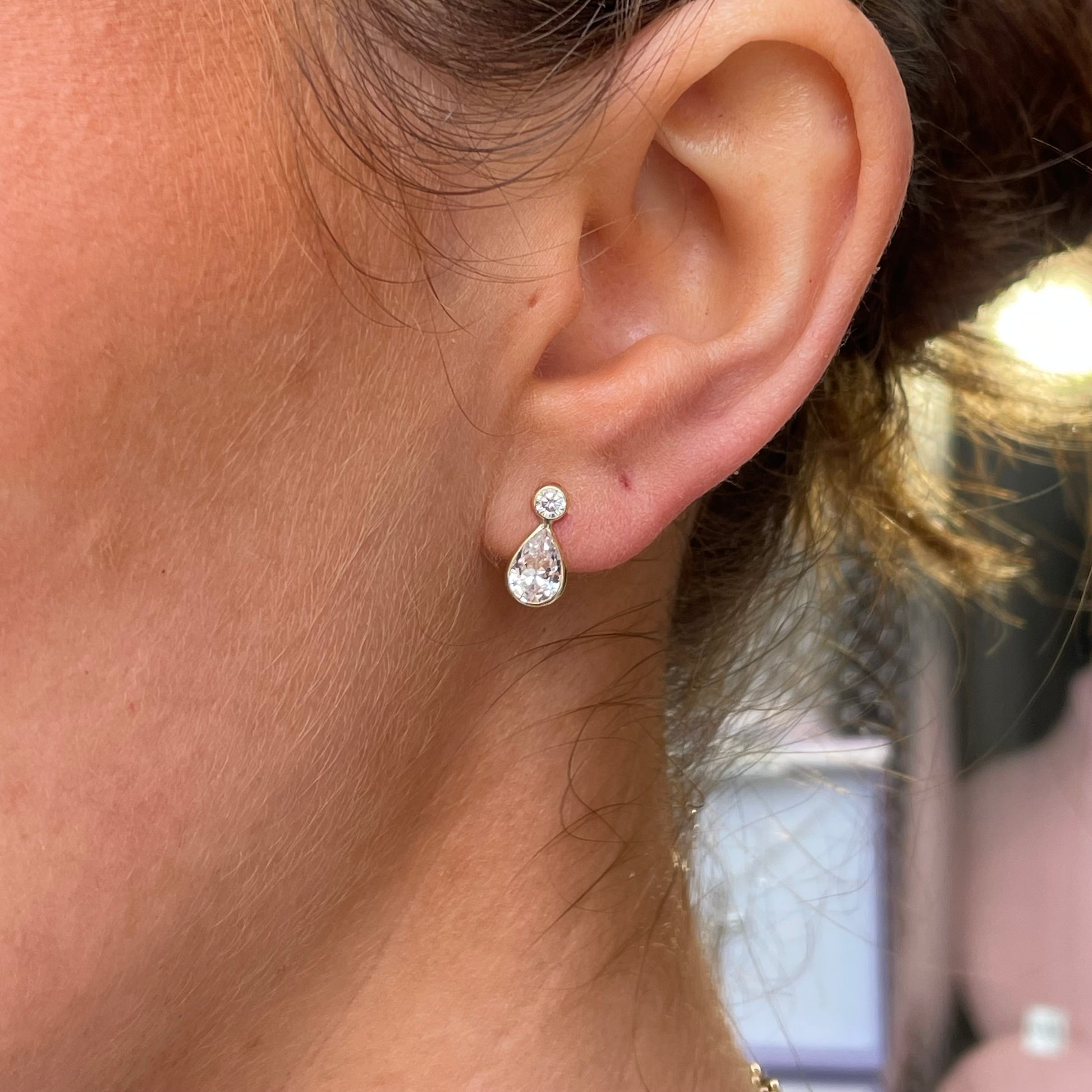 9ct gold pearl and round cubic zirconia stud earrings by Mark Milton, featuring a rubover setting and elegant design.