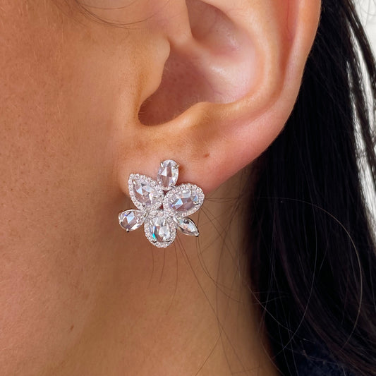 Silver mixed CZ halo stud earrings by Comero with sparkling cubic zirconia stones and a sleek, elegant design.