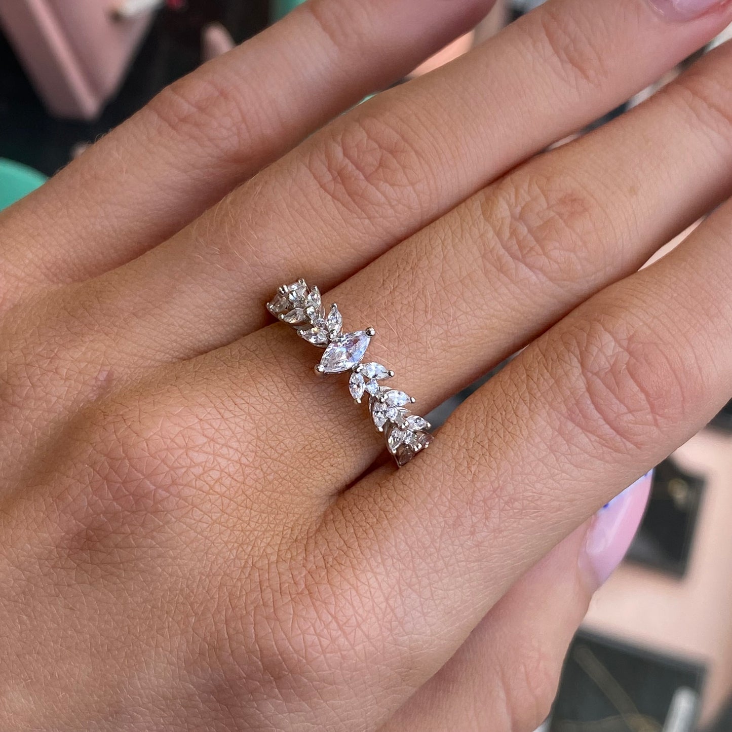 Silver Katelyn ring by Comero featuring a sleek band and minimalist design, displayed on a neutral background.