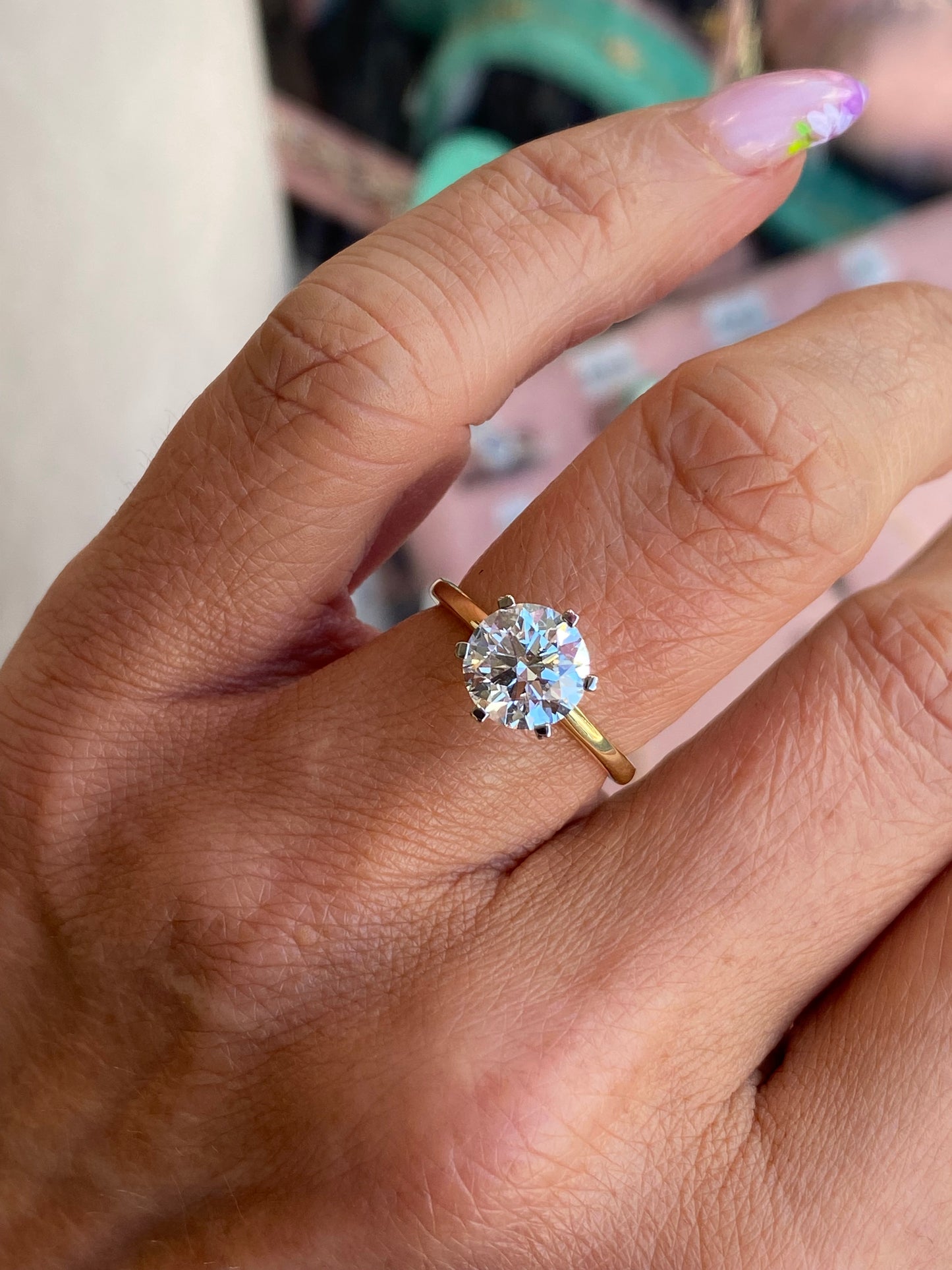 18ct gold solitaire engagement ring by Domino with a 2.02ct certified lab diamond, featuring a classic and elegant design.