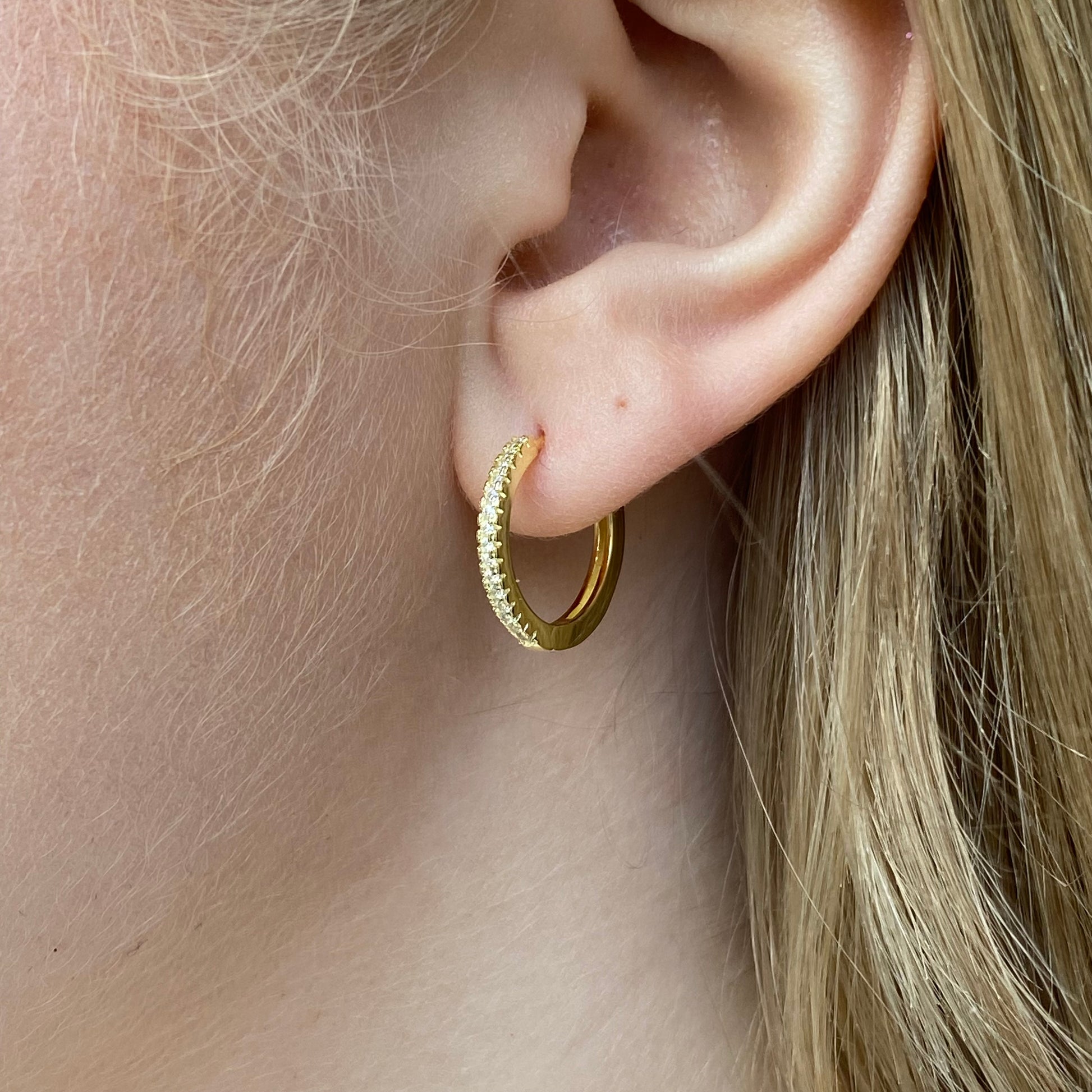 Sunshine Skinny CZ Hoop Earrings by Comero, 17mm diameter, featuring sparkling cubic zirconia stones in a sleek hoop design.