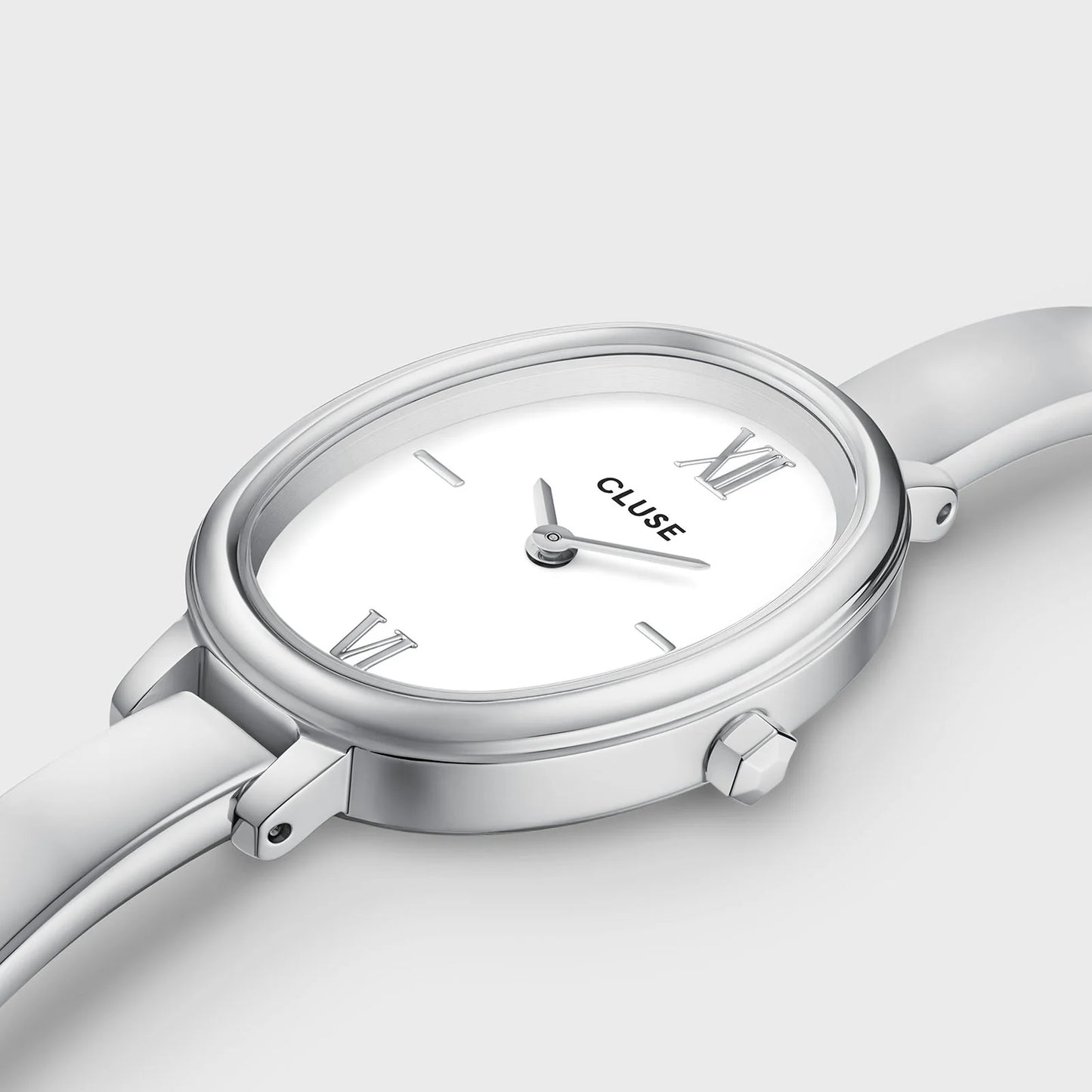Close-up of the CLUSE L'Ovale Silver watch showing its elegant oval silver dial and sleek minimalist design.