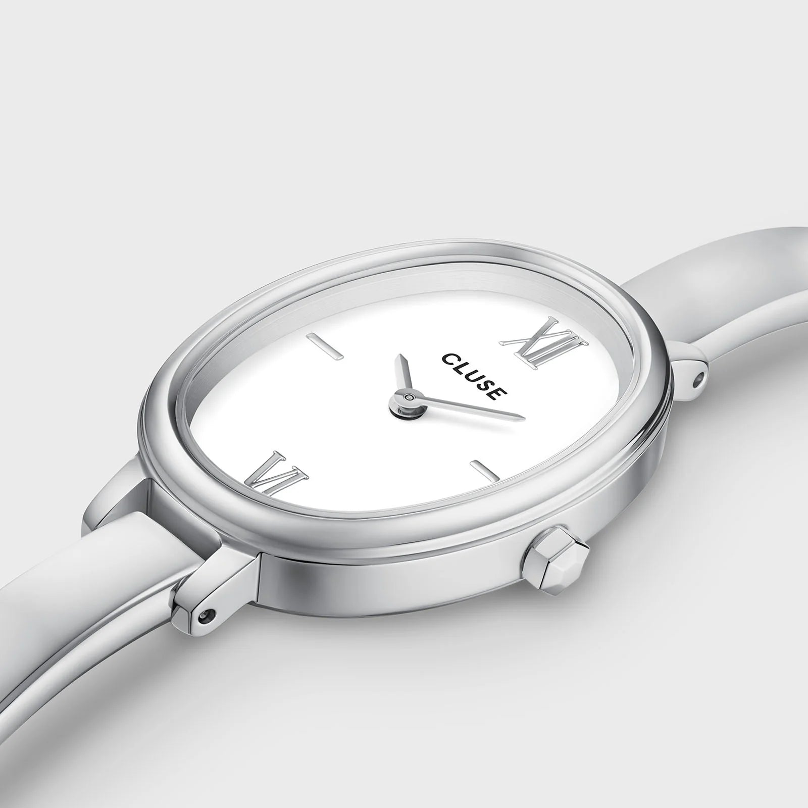 Close-up of the CLUSE L'Ovale Silver watch showing its elegant oval silver dial and sleek minimalist design.